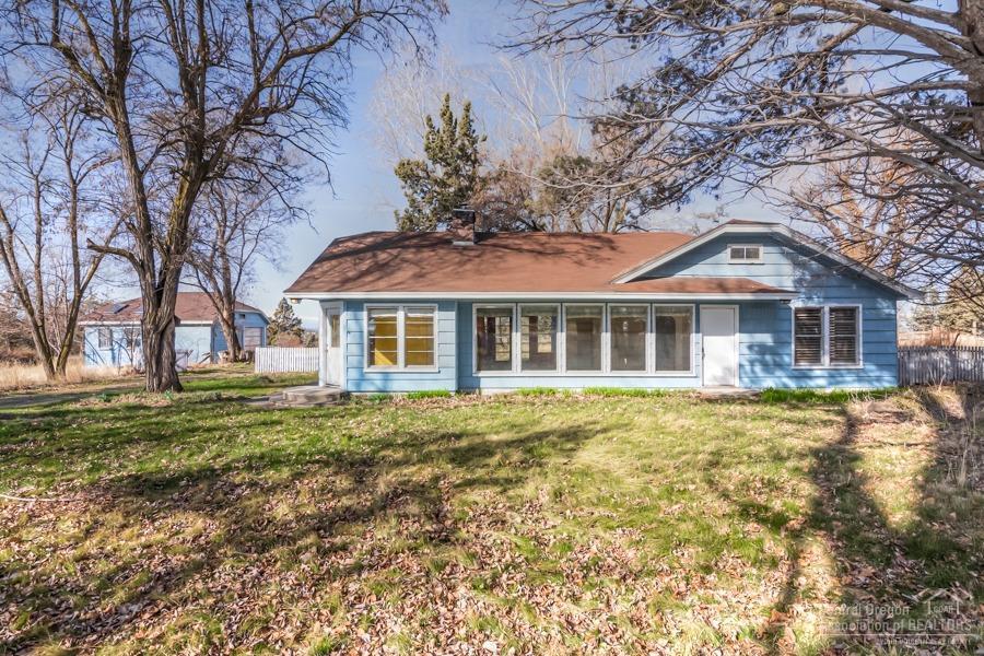 Opportunities abound! Nice 9.05 acres with 3.75 acres of irrigation and detached garage. 3 bedroom, 1 bath home plus mountain views and room for all your critters on this close-in acreage. Tons of possibilities! Detached garage has 220v power.