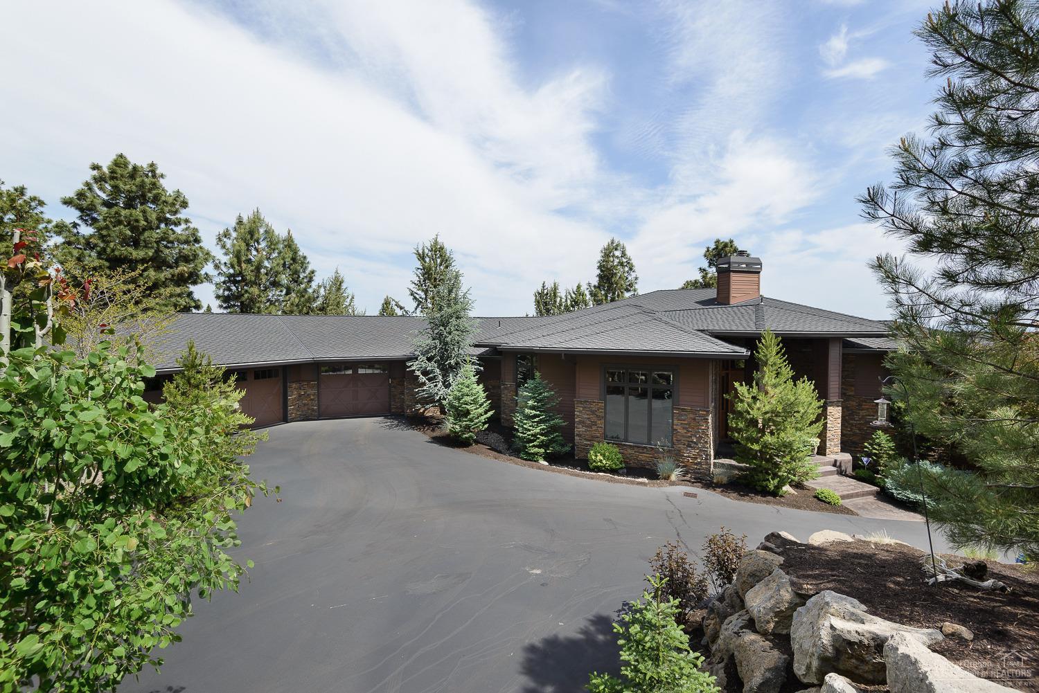 Amazing custom home on 1.77 acre lot on Awbrey Butte w/beautiful views! Attention to detail throughout with master on main, 2 bedrooms with private baths, 3 half baths, den, bonus room w/fireplace, wine cellar, exercise room. Spacious great room w/stone fireplace & built-ins. Kitchen w/commercial style appliances, built-in refrigerator, pantry, eating bar & butler's pantry. Private entertaining size covered deck w/built-in BBQ cooking area. Extensive landscaping w/fencing. Oversize 3 car garage w/built-ins.