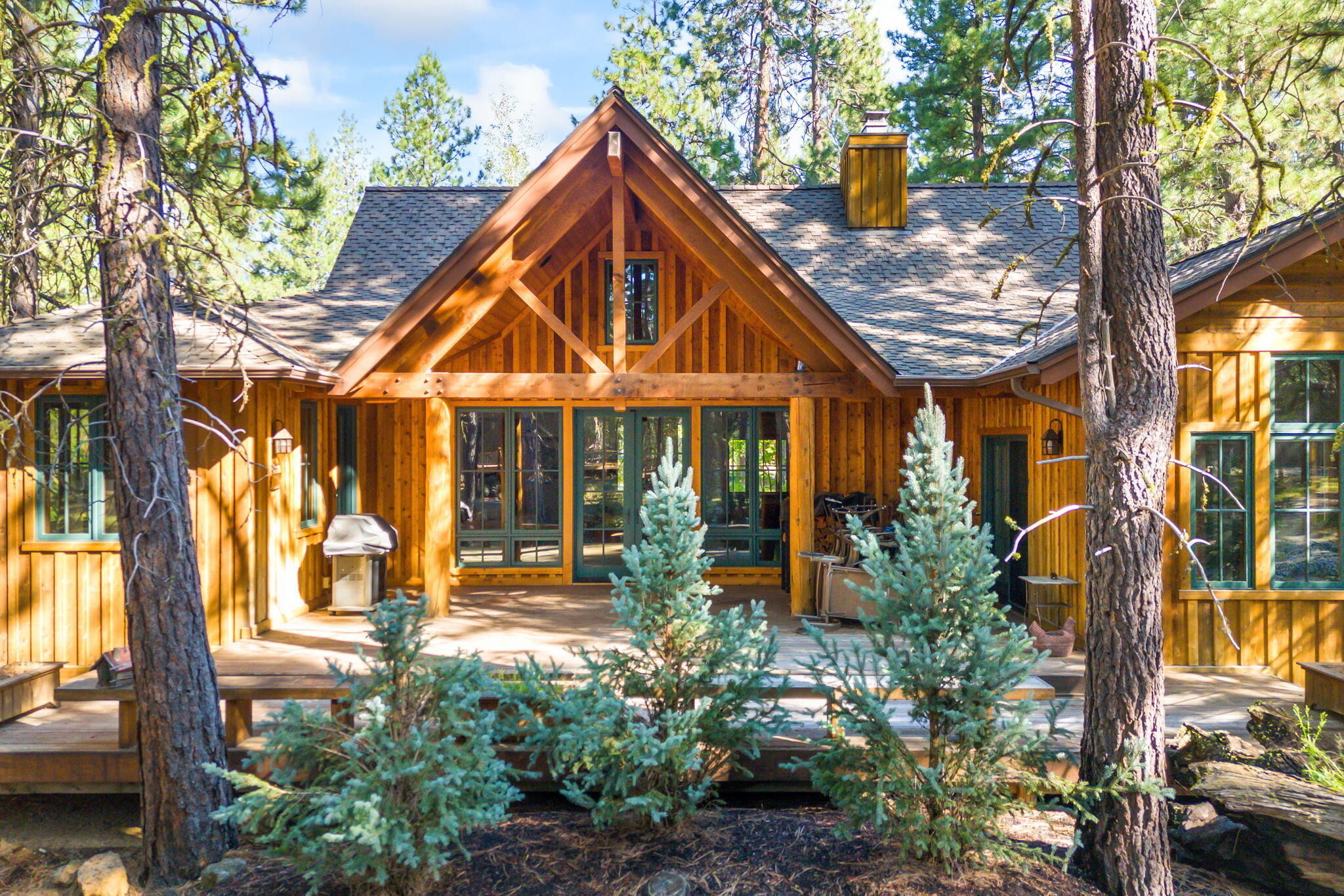 Experience the charm of this single-level craftsman style home in the heart of Black Butte Ranch. As you step through the front door you're welcomed by a spacious open-concept layout featuring vaulted tongue and groove ceilings, large wood-framed windows, and a cozy wood-burning fireplace. The timeless kitchen is a centerpiece, seamlessly blending style and functionality. The great room opens to a large, partially covered back deck ideal for entertaining year-round. Each of the three generously sized bedrooms boasts its own en suite bathroom, providing privacy and comfort for all. Additionally, a dedicated office space with a built-in desk and an entire wall of custom cabinetry offers the perfect spot for productivity. The craftsmanship and aesthetic appeal of this home are unparalleled! BBR is home to stunning mountain views, pristine lakes, and world-class amenities including top-notch restaurants, sports courts, scenic trails, and easy access to public lands.