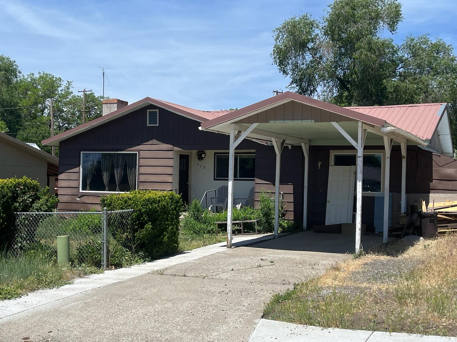 This charming 3 bedroom, one and one-half bath home with 1538 sq. ft. features a spacious living room, with great light from the south facing window and a large room for either a family room or large dining area. The three bedrooms are good sized. The main bedroom is complimented with the half bath. With just a little TLC, this home is ready for your family! This home is in an estate, no Owner Carry options. The sellers will consider a flooring allowance for the dining, kitchen area. Conventional financing or cash only.