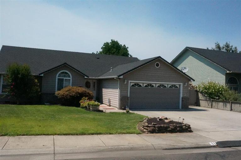 Meticulously cared for, Move-in Ready home! Beautifully landscaped fully fenced yard w/garden shed. Expansive Master bedroom features large bath w/walk-in closet. Vaulted ceilings throughout the home, gas fireplace and built-in shelves in the spacious living room opening up to formal dining area and spacious kitchen. Sit on the huge covered porch and enjoy your large private backyard. Parking on side of house for RV and toys. Conveniently located near shopping and schools. This 3 bd/2ba home was built in 2000 and has been loved and cared for ever since. According to the city of Central Point this address is not in a flood plain and no flood insurance is required. It's designation is X. Buyer to do own due diligence.
