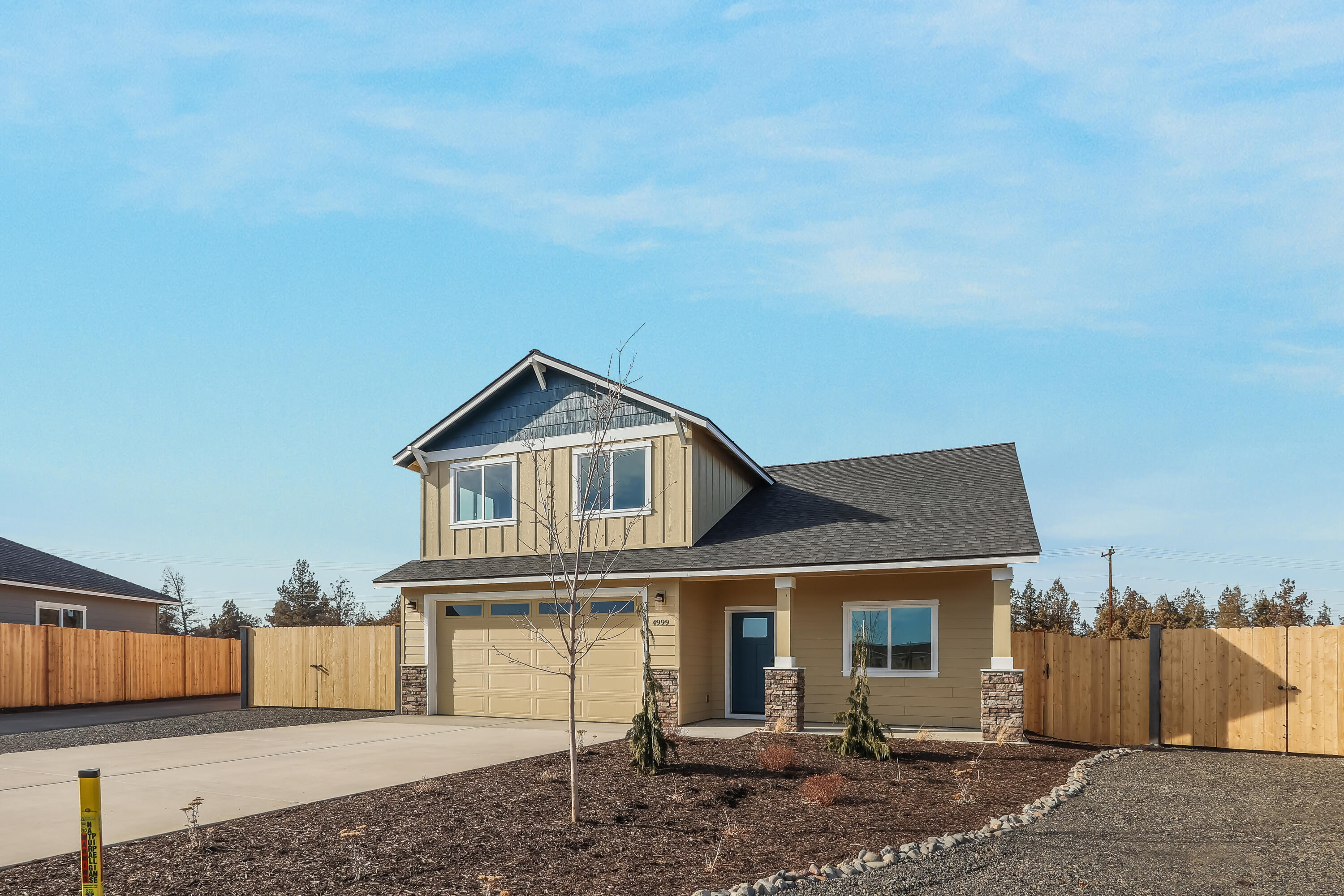 Completed & Move-In Ready! Lot 20 features the Willow floorplan w/ 3 bedrooms + XL bonus room w/ mtn views, office / den, 2 1/2 baths & 2 car garage, extra wide RV / boat side yard parking & separate entrance gate. Open floorplan kitchen w/ SS appliances, corner walk-in pantry, full height tiled backsplash, soft-close cabinets, extensive slab quartz countertops & large island opening to great room w/ decorative gas burning fireplace & access to backyard. Primary bedroom on main level w/ mtn views, sliding glass door to backyard, box ceiling & full bath w/double vanity & enclosed toilet. Upstairs features XL bonus room, 2 bdrms, full bath & laundry/utility room. Durable laminate plank flooring thru-out & carpeted bdrms. Landscaped front & backyard with sprinklers & fencing. Upgraded finishes & A/C included! Korbin Meadows is a new community in desirable neighborhood of SW Redmond. Photos are of home of similar floorplan. *Floorplan & finishes vary.