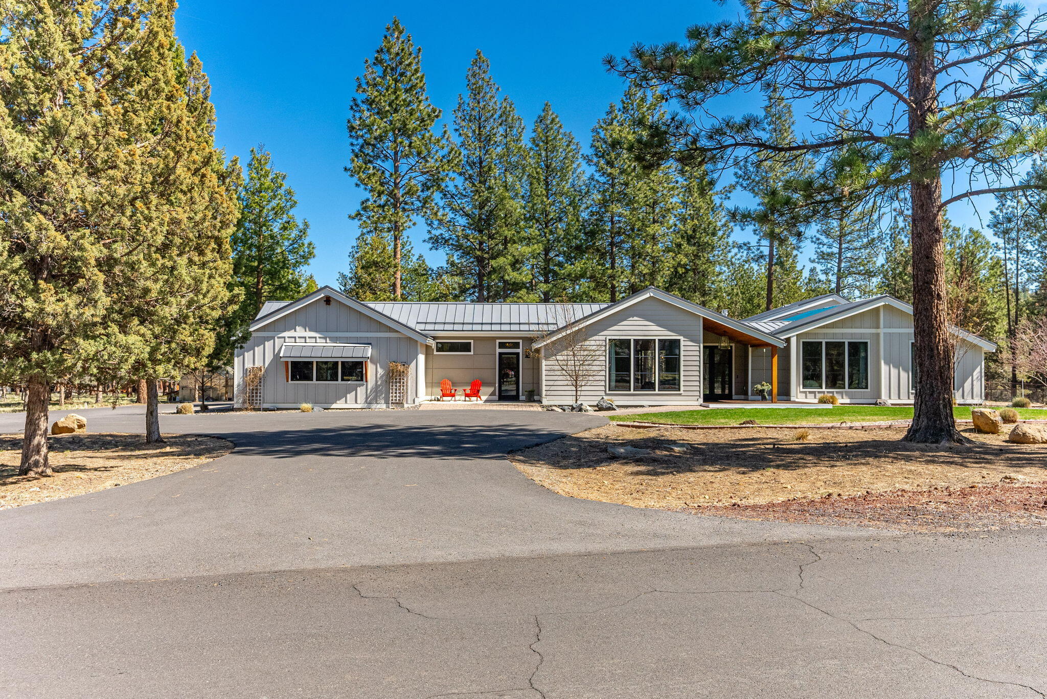 Located on Bend's westside, the iconic neighborhood of Saddleback will give you the space you've been wanting while still being near downtown Bend, Shevlin Park and all the outdoor recreation you love in Central Oregon. This single level flowing, spacious home was fully remodeled in 2018 with updates to major components including insulation, windows, doors, heating, cooling & roofing. Of course, all of the modern luxuries have been added to the kitchen, bathrooms & laundry. The oversized two car garage allows plenty of room for your cars & toys, plus there's a heated, oversized Sprinter/RV bay. The back deck is perfect for entertaining and enjoying Bend's epic summer with a pass through window from the kitchen to keep the food and drinks flowing to your guests. This 2.5 acre parcel is the perfect blend of elbow room, yet not overbearing or requiring constant maintenance. There's already space for a barn, ADU, office sanctuary in the trees or a shop, with power & driveway in place.