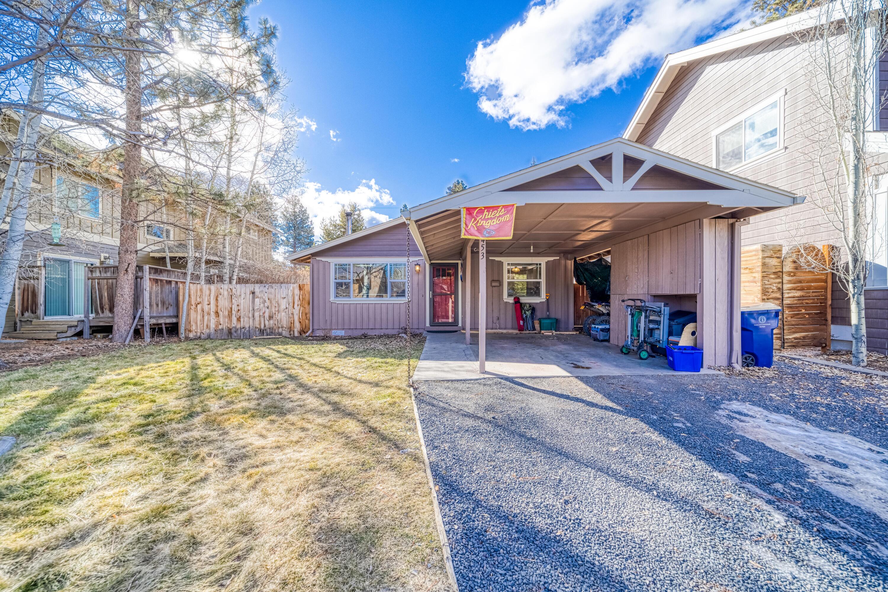 Location Location! Within blocks of this home are coffee shops, restaurants, downtown Bend, Drake Park and the Deschutes River. This 3 bedroom, 1 bath cottage has been updated in the past few years which include: subway tiled shower, water heater, fridge, new vinyl floor, sinks, faucet, vanity. New interior doors and trim. Front of the house façade. Nice fenced backyard. Locked off storage in the carport. This property has loads of charm and tons of potential.