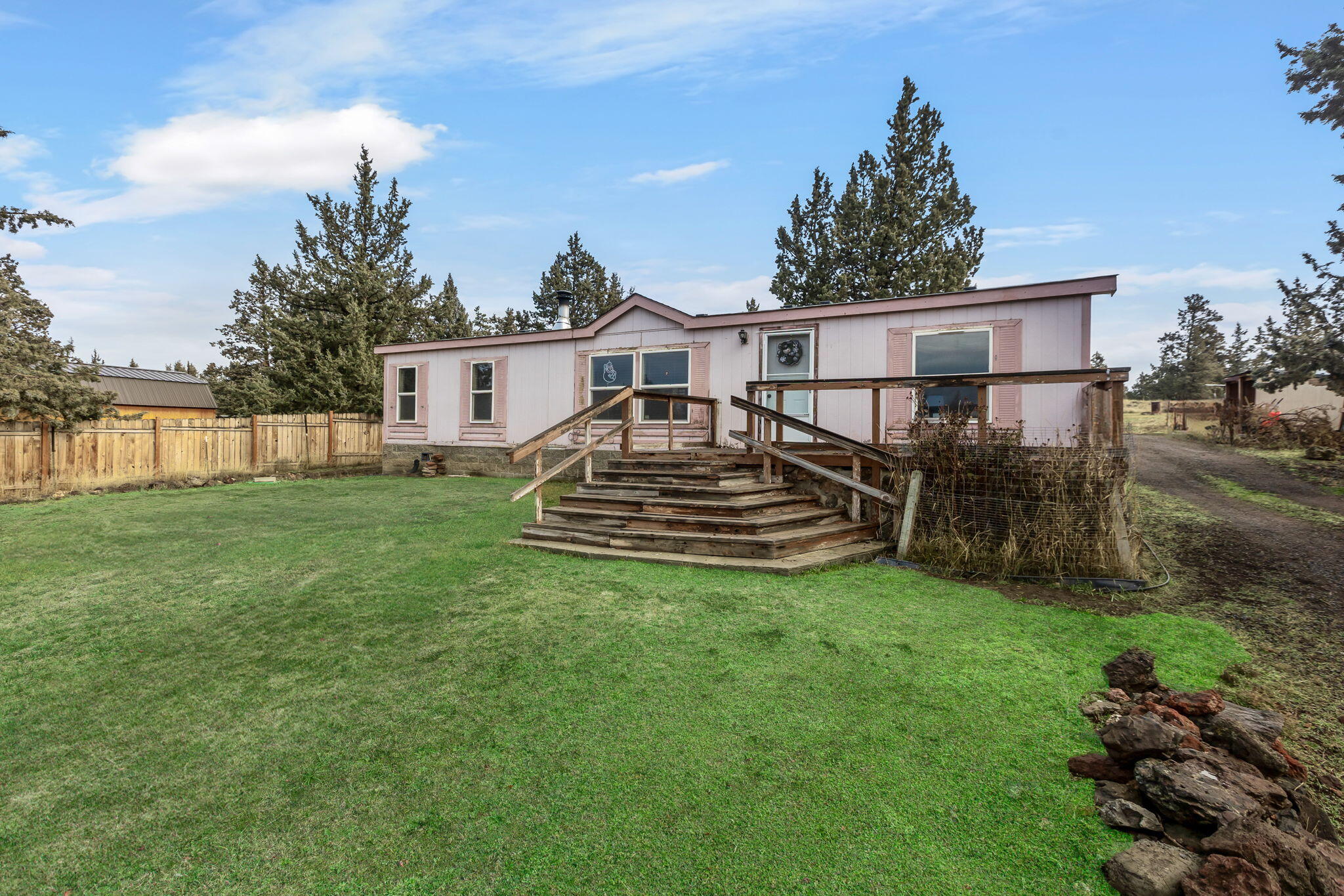 This home in Crooked River Ranch could make for a great investment property, fixer upper, flip, or new home with some sweat equity. Sitting on over an acre with mountain views! The detached garage is great for parking, storage, or projects. The home is being sold as is only.
