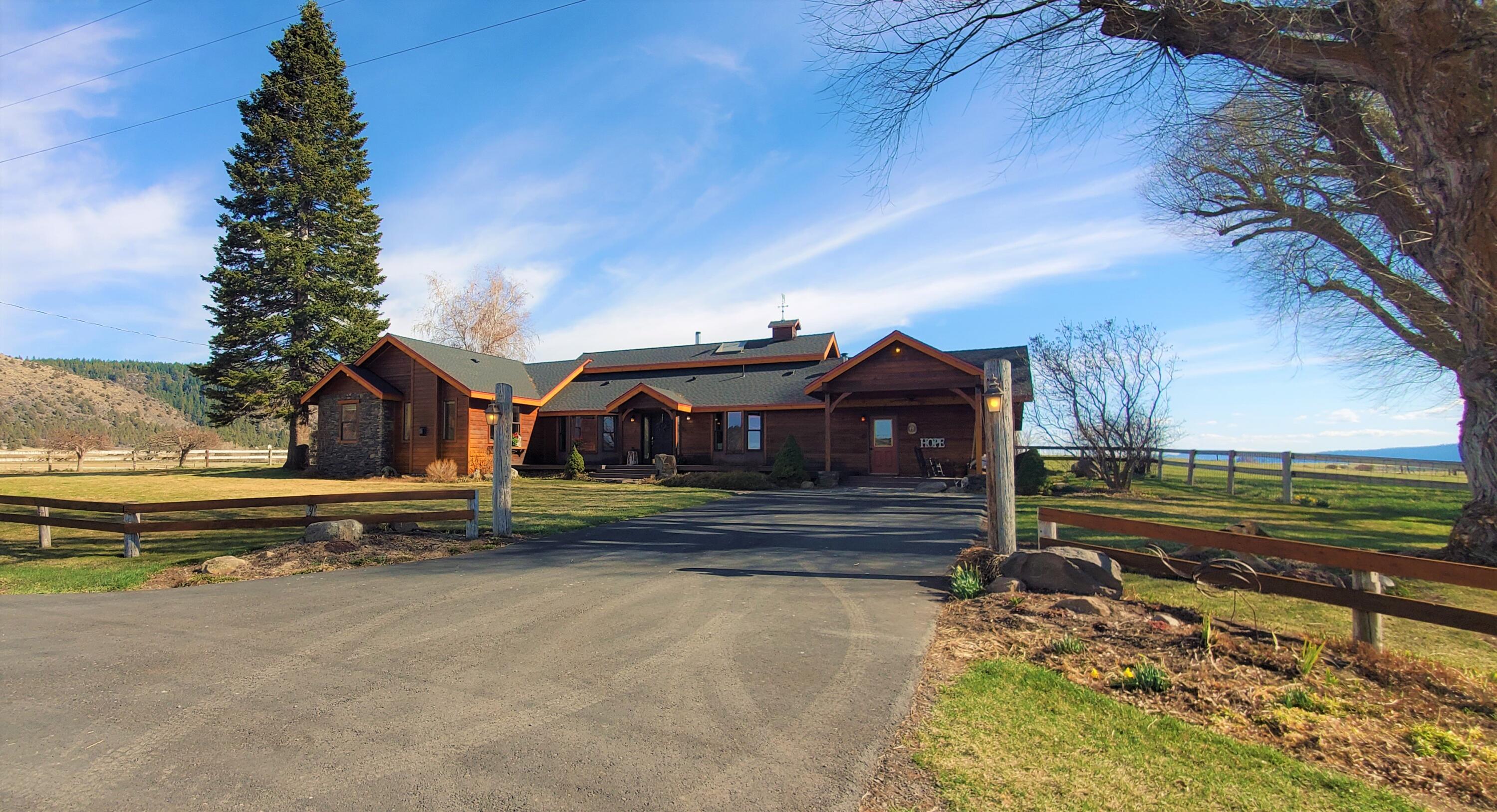 Expansive views of Mt. McLaughin and Crater Lake National Park are right out your back door on this rural paradise 15 minutes from Klamath Falls, OR. This is a one-of-a-kind family ranch. A beautiful 3010 sq. ft. custom built farmhouse sits on just over 175 acres. The property includes a 6,000 sq. ft. barn, 2,100 sq. ft. hay storage and 1,400 sq. ft. detached garage. The main home features 3 bedrooms, 3 baths, a custom chef's kitchen complete with stainless steel appliances, large living room with wood burning fireplace, office, laundry room, an amazing loft and a beautiful hand-crafted greenhouse. A studio apartment is connected to the main home and has a great rental history as a VRBO. Solar panels provide supplemental power for the home and barn. Property is currently setup for intensive grazing. The Ranch is located within minutes of world class fly fishing, hunting and hiking and 30 minutes to Crater Lake National Park! This is a must see property!