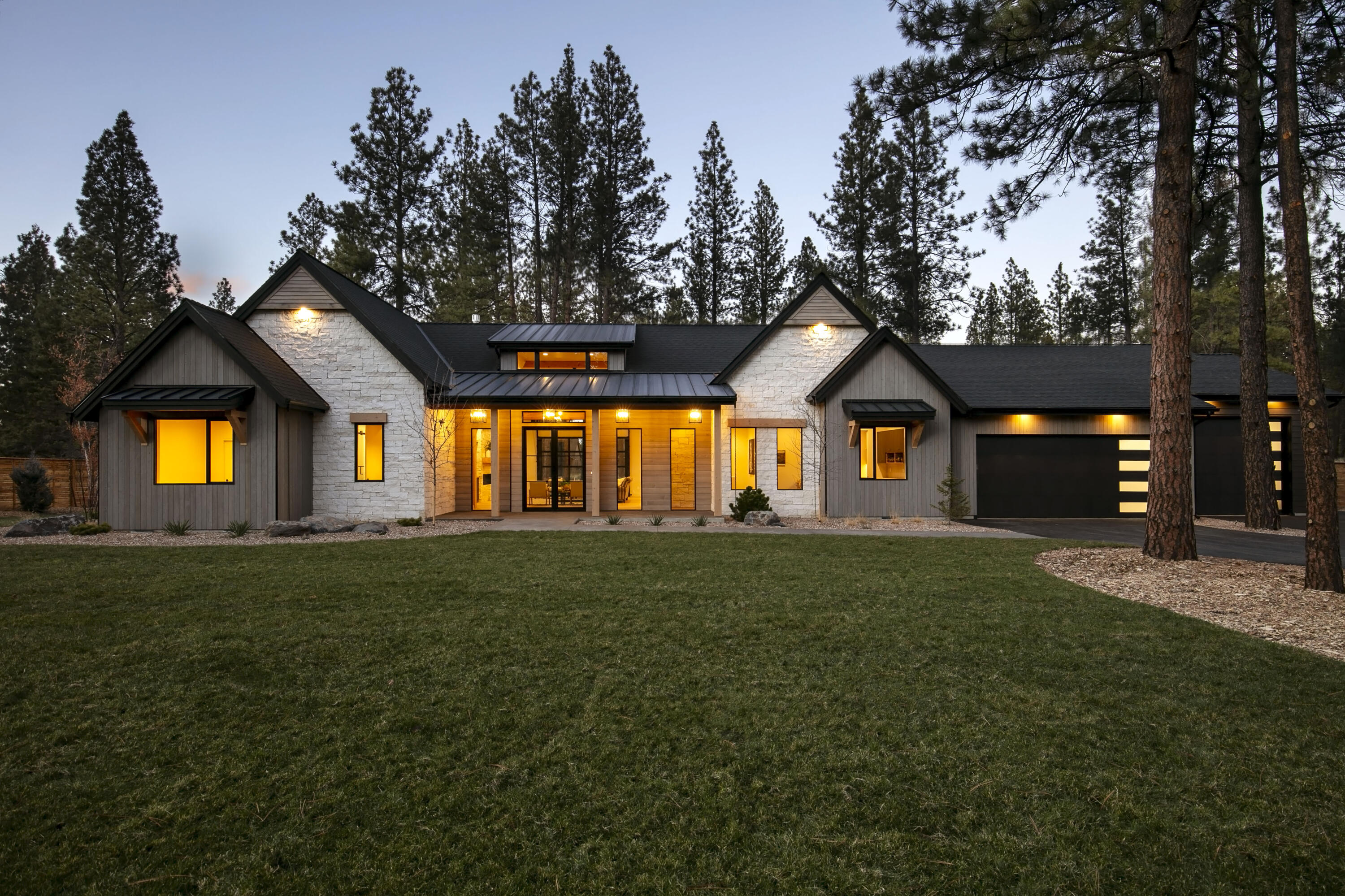 Escape the ordinary and immerse yourself in a unique blend of nature and luxury at this custom retreat on 2.5 acres. Extraordinary attention to detail with an exceptionally scenic & private setting. Open concept living area offering an effortless flow from the gathering space with gas fireplace to the kitchen with oversized island, double oven, wine bar and built in refrigerator. Large butler's pantry. Thoughtfully designed spaces fill the home, with great separation for the primary suite and private patio, additional bedrooms with jack and jill bath, office or 4th bedroom and large mudroom. Vaulted covered patio with timbered ceilings. The spacious lot provides enough room for a shop or ADU. Attached 3 car garage, 3rd bay with 10 foot door. Adjacent to Bend city limits, this spacious home showcases modern finishes, abundant natural light, and forest views located just blocks from Brookswood Meadow Plaza & 3 River Rim Parks.