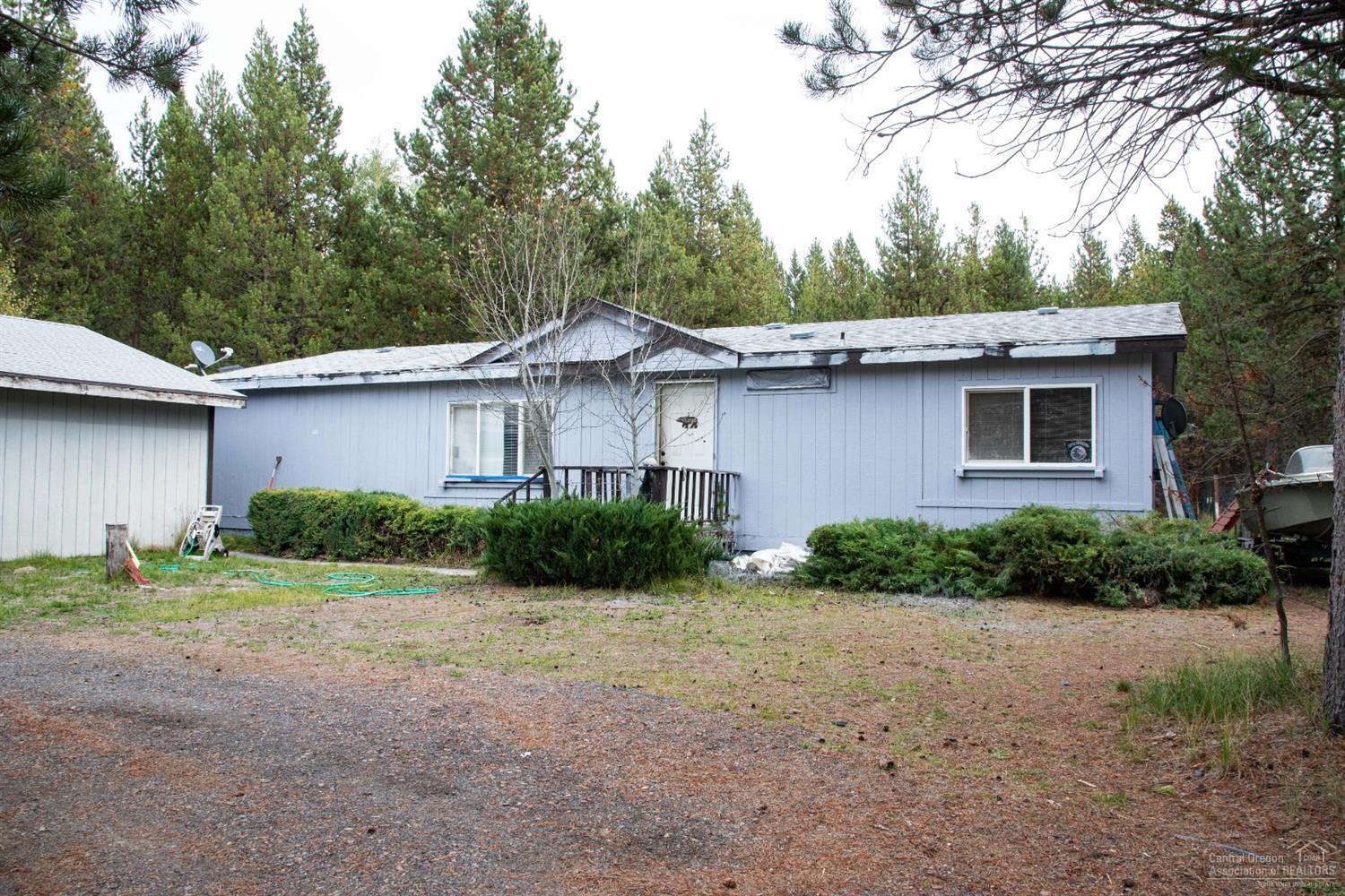 Investment property with detached garage on half an acre in OWW. Across the street from DeschutesRiver and close to all outdoor recreation Central Oregon has to offer. Nice neighborhood, HOW covers private community boat launch. As-Is, priced purposefully to reflect repairs needed, great flip opportunity, ready for some TLC.