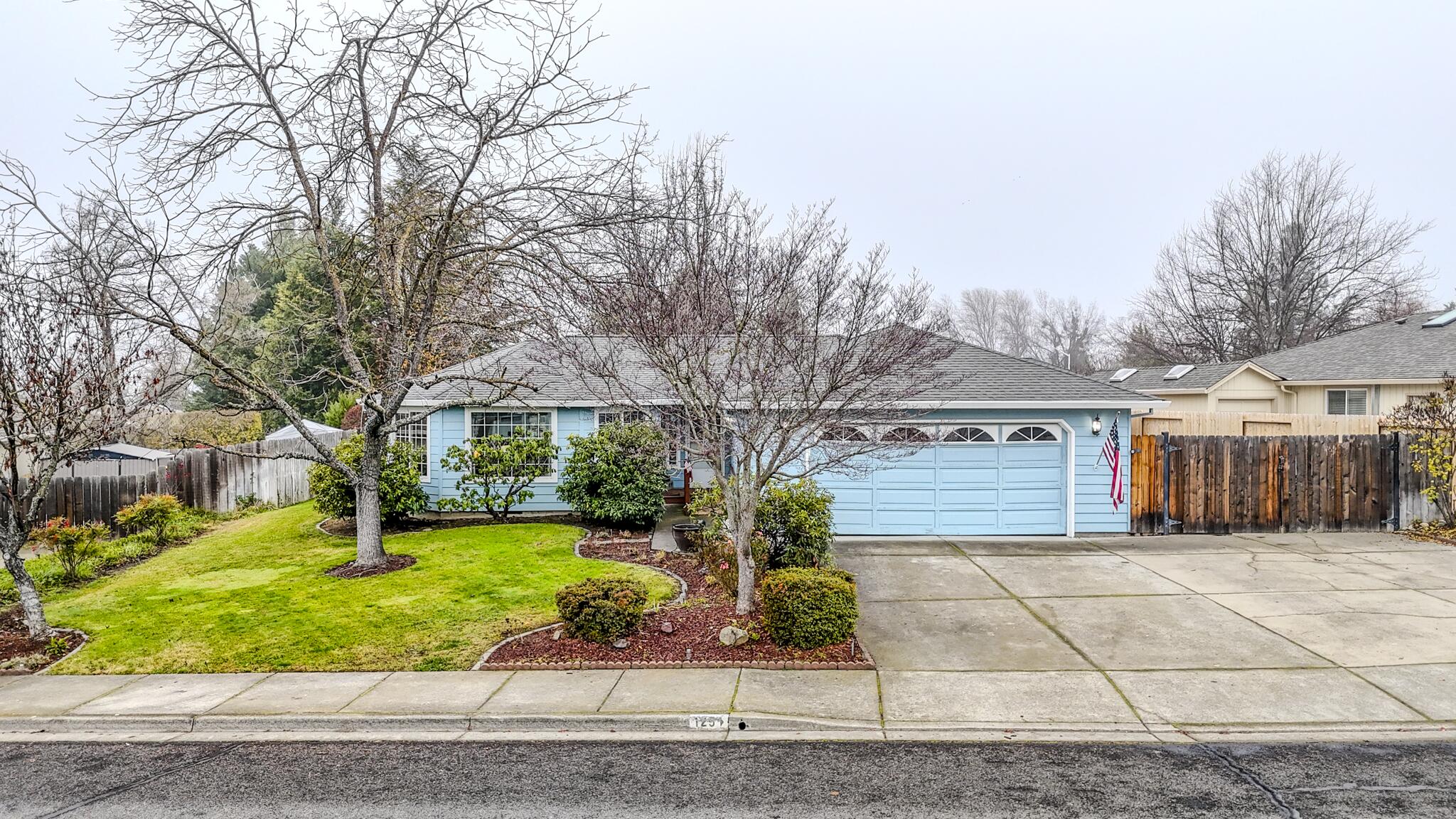 Welcome to this well-maintained 3-bedroom, 2-bath home located in the highly desirable Meadow View Estates community in Phoenix, Oregon. This ideal location offers exceptional convenience with close proximity to shopping, medical facilities, local wineries, and easy freeway access for quick travel throughout the Rogue Valley. The home features a comfortable, functional layout with an inviting living area, a bright kitchen, and spacious bedrooms designed for everyday ease. The primary suite includes a full bath, creating a private retreat within the home. Outside, the fenced backyard provides a safe and versatile space for pets, gardening, or outdoor gatherings. Set within a beautifully kept neighborhood known for its quiet streets and mountain views, this property delivers both comfort and lifestyle. Whether you're a first-time buyer, downsizing, or seeking a low-maintenance home in an excellent location, this Phoenix residence is a wonderful opportunity.