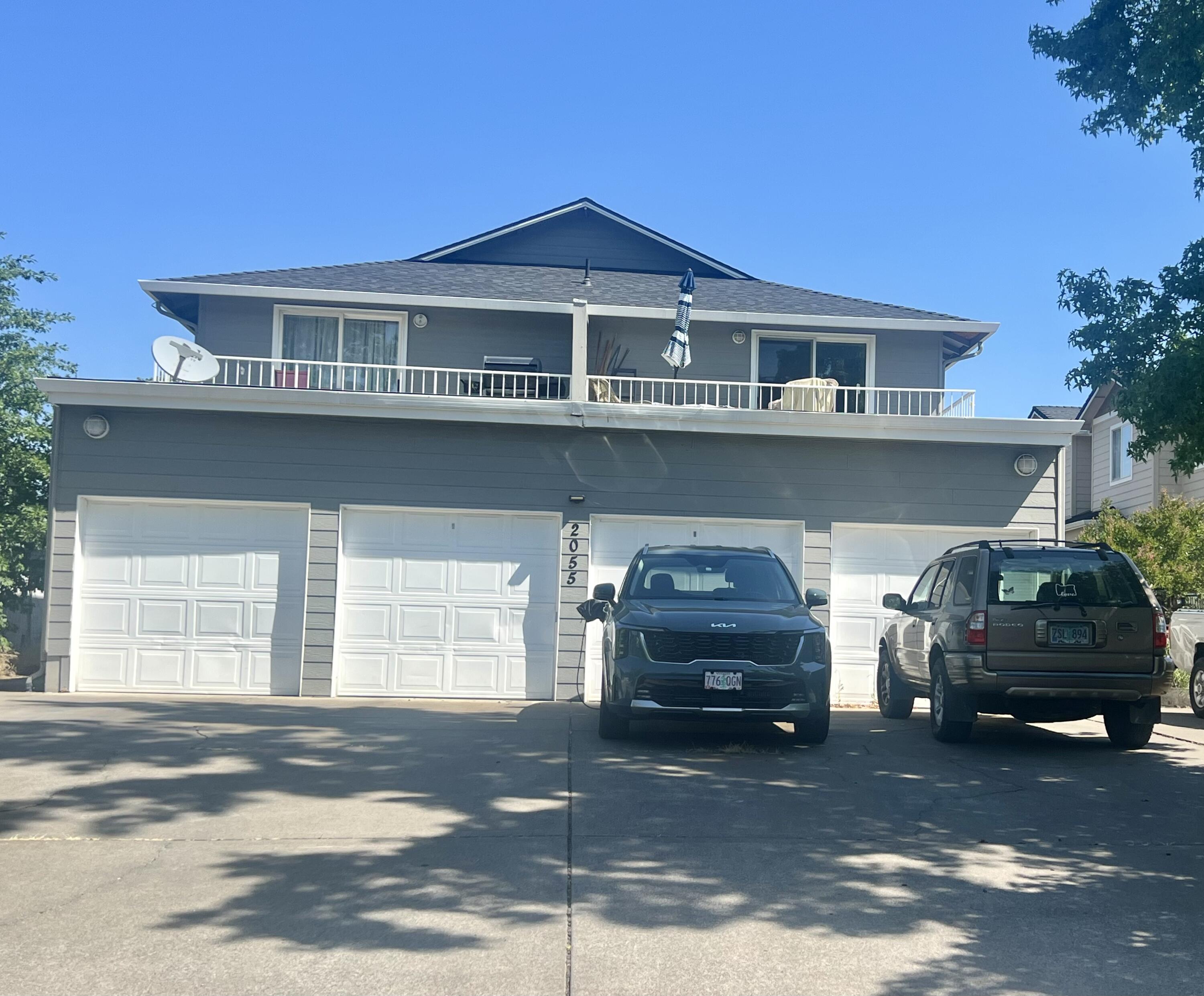 Well-maintained 1991-built quadplex tucked on a quiet dead-end street near North Medford High School. This 3,816 SF two-story property features four identical 2BD/1.5BA units, each w/an attached single-car garage and separate gas and electric meters. No HOA. Professionally managed with attractive, low-maintenance landscaping. Units 2 and 3 are currently vacant. Unit 2 has been recently refreshed, while Unit 3 remains in original condition, offering additional upside through light improvements and rent-up. Gross Scheduled Income of $62,220 reflects current rents plus pro-forma market rents on the two vacant units. One long-term tenant remains at a below-market rent due to prior ownership decisions; rents may be adjusted by a new owner in compliance with Oregon landlord-tenant law and required notice periods. Owner pays water, sewer, and garbage. A solid, low-maintenance multifamily investment with value-add potential in a convenient North Medford location near schools, shopping & I-5.