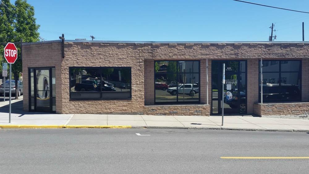 Nice building in the heart of downtown Klamath Falls. Formerly the Veteran's Office building. Located one block from the County seat and government buildings and courthouse. Building is divided into two spaces: one consists of 5 office spaces and the other is a large meeting room, which is currently used by community non-profit groups as a meeting place. Separate exterior entrances for each space. Buyer could keep separate and lease out one space or open up and use both spaces for a total of 3289 sq. ft. Zoned General Commercial. Bring your ideas and proposals. Appointment only please, as we need to check that the community space is not being used at the time of showings.