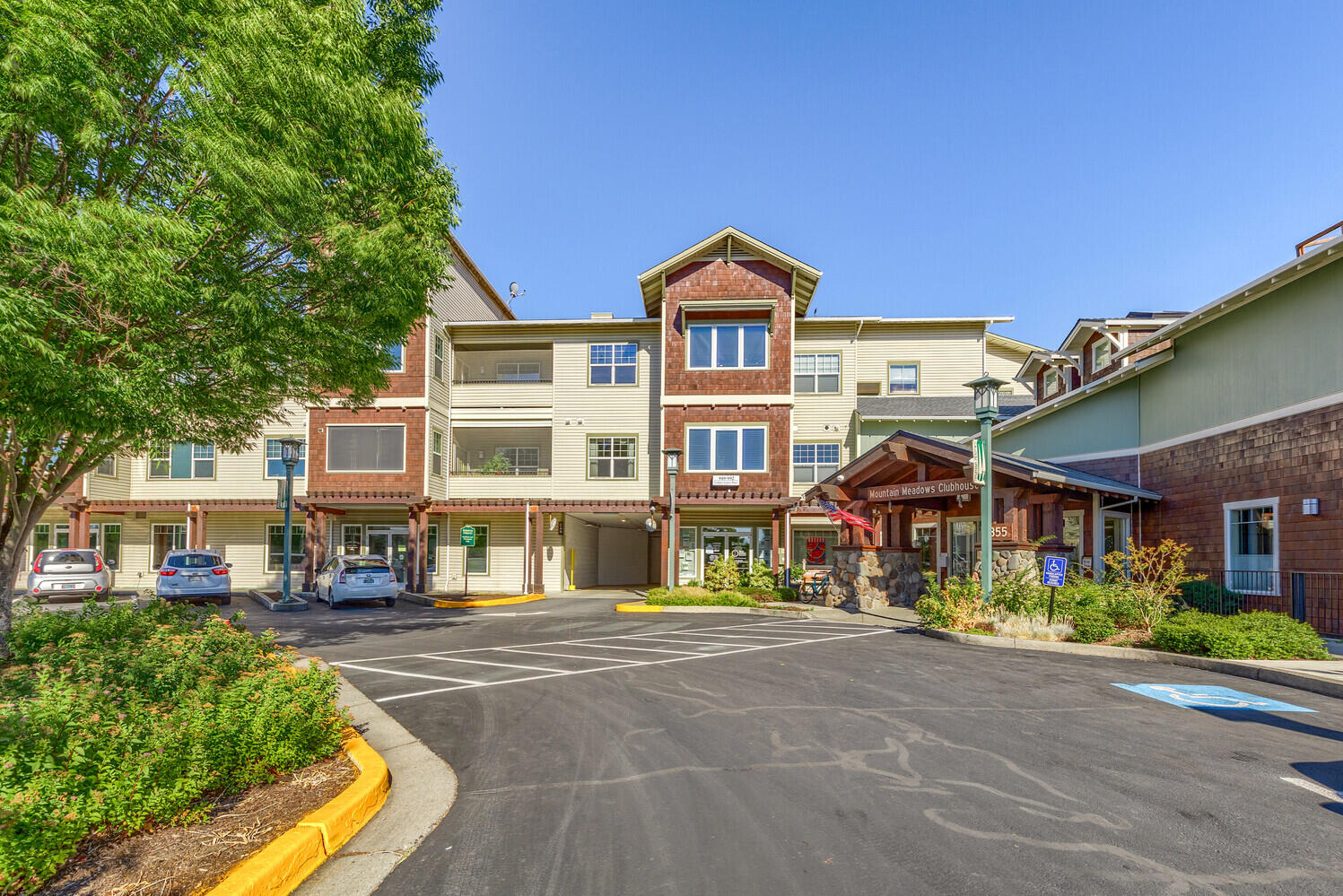 Experience the pinnacle of comfortable living in this second-floor condo, perfectly positioned adjacent to the clubhouse and parking garage in the highly sought-after 55+ Mountain Meadows Resort Community. This unit is one of the larger two bedroom units, with west facing views offering stunning sunsets all year long. The prime location makes it ideal to take advantage of the elevator, dining, mailroom, swimming, gym, and the rest of the multitude of activities covering many different interests! This well appointed 2 bedroom, 1.5 condo is the perfect place to make friends in this welcoming community. Come and see!
