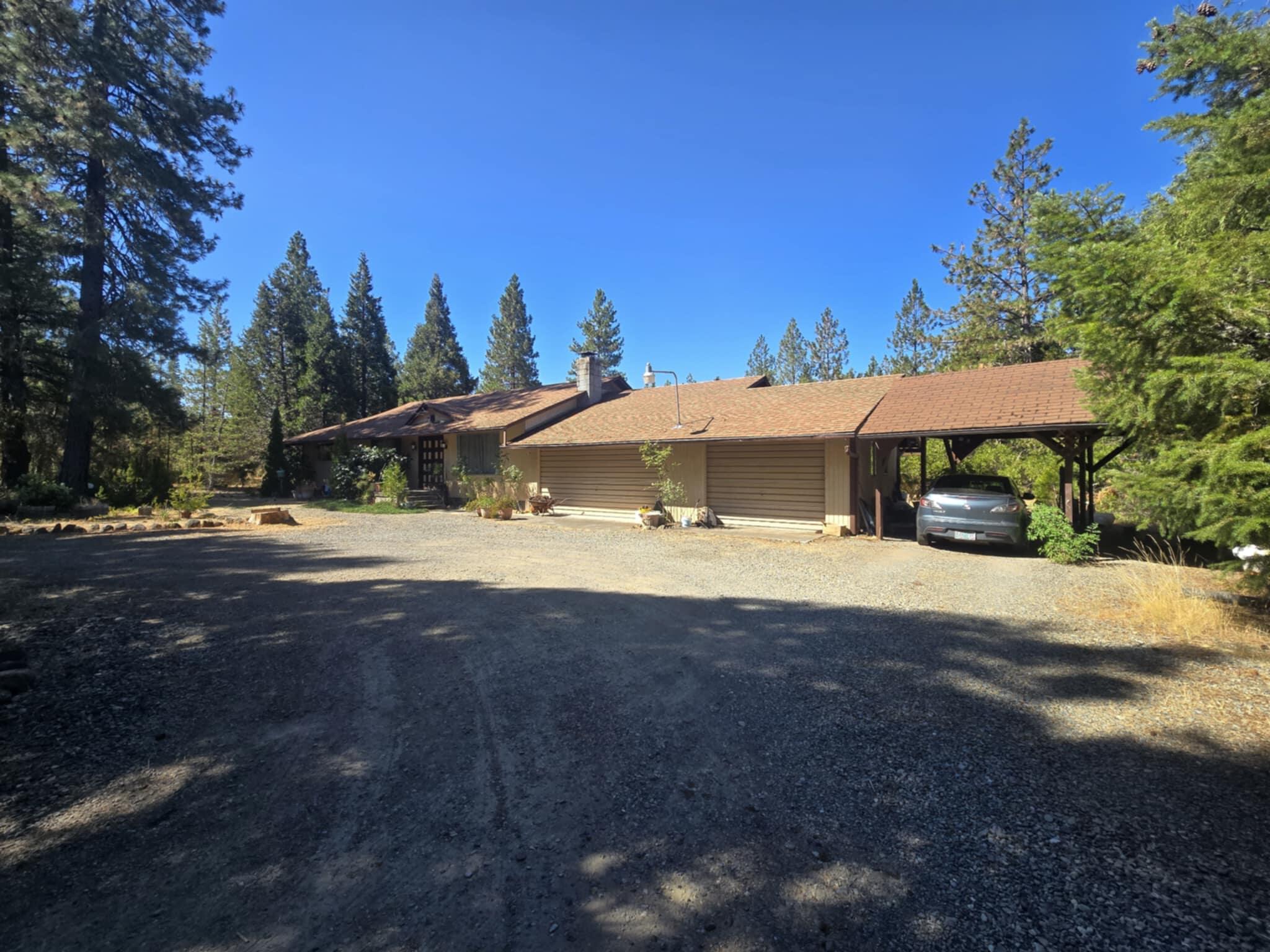 Beautiful Home on 5.07 Peaceful Acres

Tucked away in a serene wooded setting, this charming 1,800 sq. ft. home. Built in 1978, the home sits on a level 5.07-acre parcel surrounded by nature, making it an ideal for those seeking peace and tranquility.

Inside, you'll find a warm and inviting floor plan with spacious living areas and generously sized bedrooms. The home is filled with timeless character and ready for your personal touch.

The property features towering trees, open spaces, and a quiet atmosphere—plenty of room for a garden, animals, or simply enjoying the outdoors.