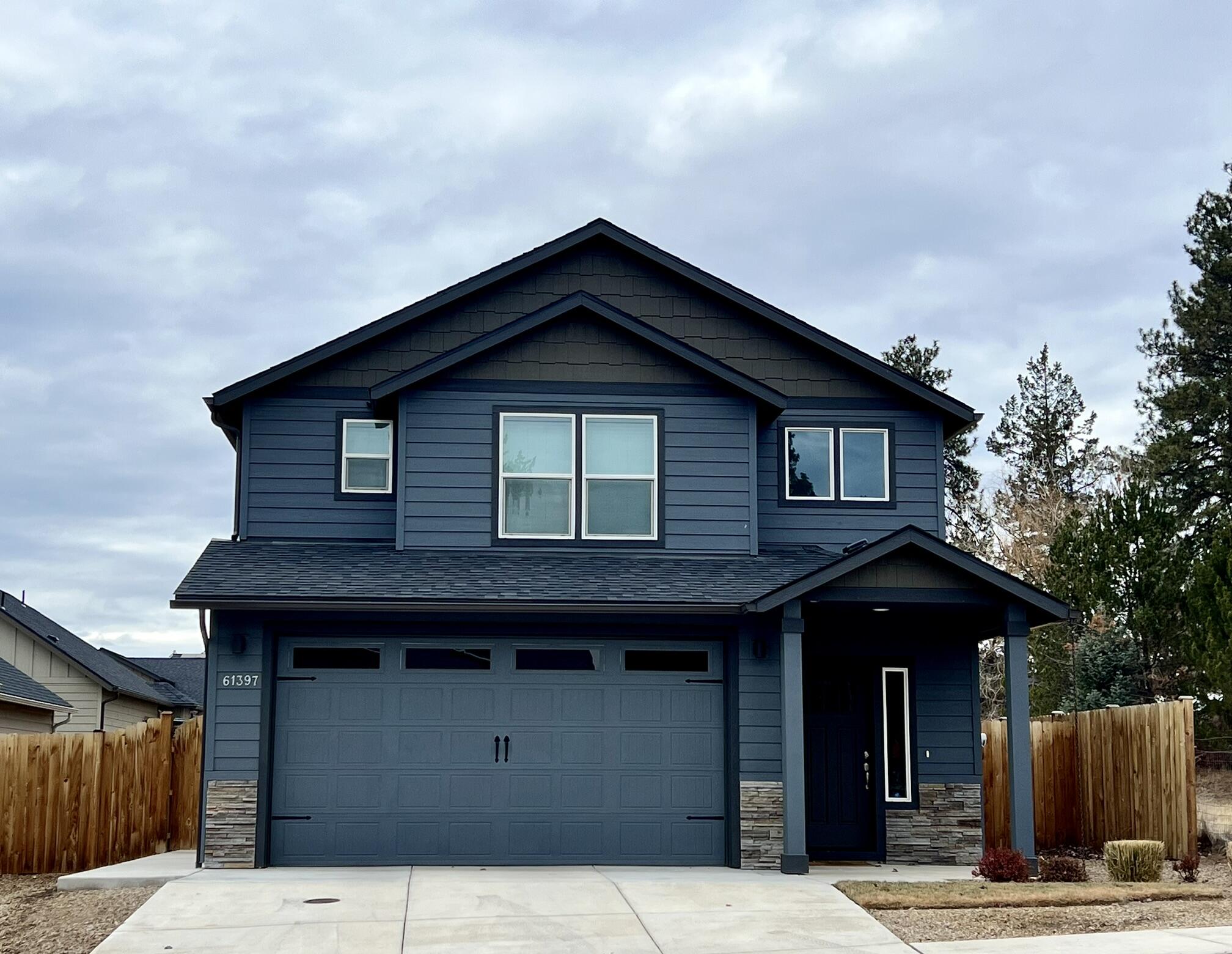 Rare opportunity to live right in the heart of Bend but adjacent to a pasture! This home is perfect for those who appreciate nature while still enjoying the closeness of all Bend has to offer. An open concept floor plan allows for the kitchen to look out over both the dining and living area creating a welcoming environment. Upstairs you'll fine a spacious primary suite with and a large walk-in closet off the attached bathroom. The secondary bedrooms are across the hall and are split with a Jack and Jill bathroom. The laundry room is conveniently located upstairs next to all the bedrooms. In your backyard you'll enjoy a covered patio and the privacy of a fully fenced yard. The garage is all ready for your plug in electric or hybrid vehicle.