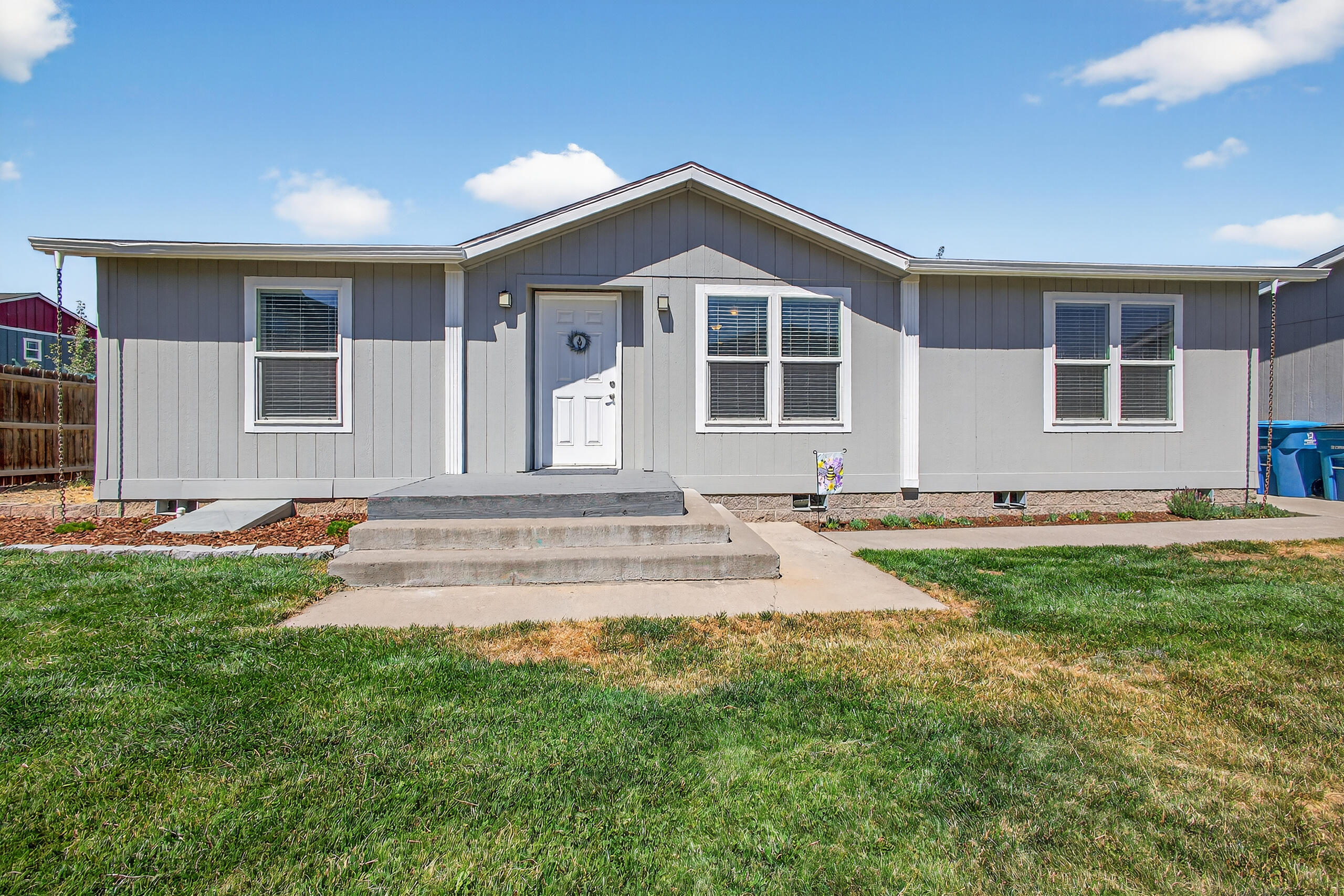 Welcome home to this beautifully refreshed 3 bedroom, 2 bathroom gem! Inside and out, this home has been given a fresh coat of paint giving it a clean, move-in ready feel. The carpets in the bedrooms are less than a year old adding a cozy touch, while vaulted ceilings create a spacious feel throughout the entire home. The floor plan offers excellent primary bedroom separation, and the large primary suite features a walk-in closet, ceiling fan, double vanity sinks, and a luxurious soaking tub. The kitchen is equipped with stainless steel appliances, perfect for everyday cooking or entertaining. Outside, enjoy a peaceful and private yard with updated landscaping. A detached 2-car garage provides plenty of storage and parking. This well-maintained home is move-in ready and full of thoughtful updates. Don't miss your chance to make it yours!