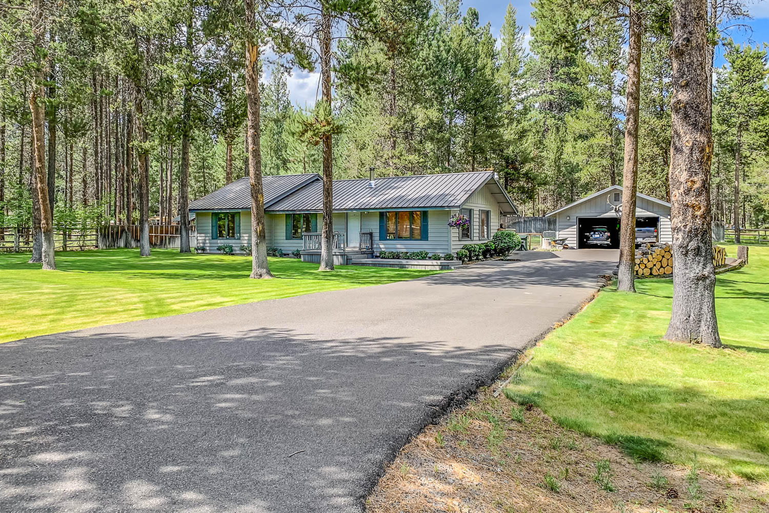 If you are looking for seclusion, while near outdoor adventures, room between neighbors and single level living, look no further. Wood burning stove warms this home throughout the Winter months while the outdoor Murphy bed lets your enjoy the beauty of the Central Oregon's clear skies. The lawn has been immaculately maintained to create a park like setting on this .78 acre parcel. The home sits just across the street from the mouth of the Spring River, community access to the river for Valley Ridge Acre homeowners. No HOA fee. The primary en-suite has been recently updated. There is a float on the septic system for east access to monitor when it needs to be pumped. Updates completed to the existing well pump & it's coordinating electrical equipment last year. Double garage & additional storage for wood and lawn maintaining equipment. Sunriver is just a quick 5-minute drive away, Mt. Bachelor & and many lakes are nearby. Time to enjoy the outdoors & create your own Central OR memories.