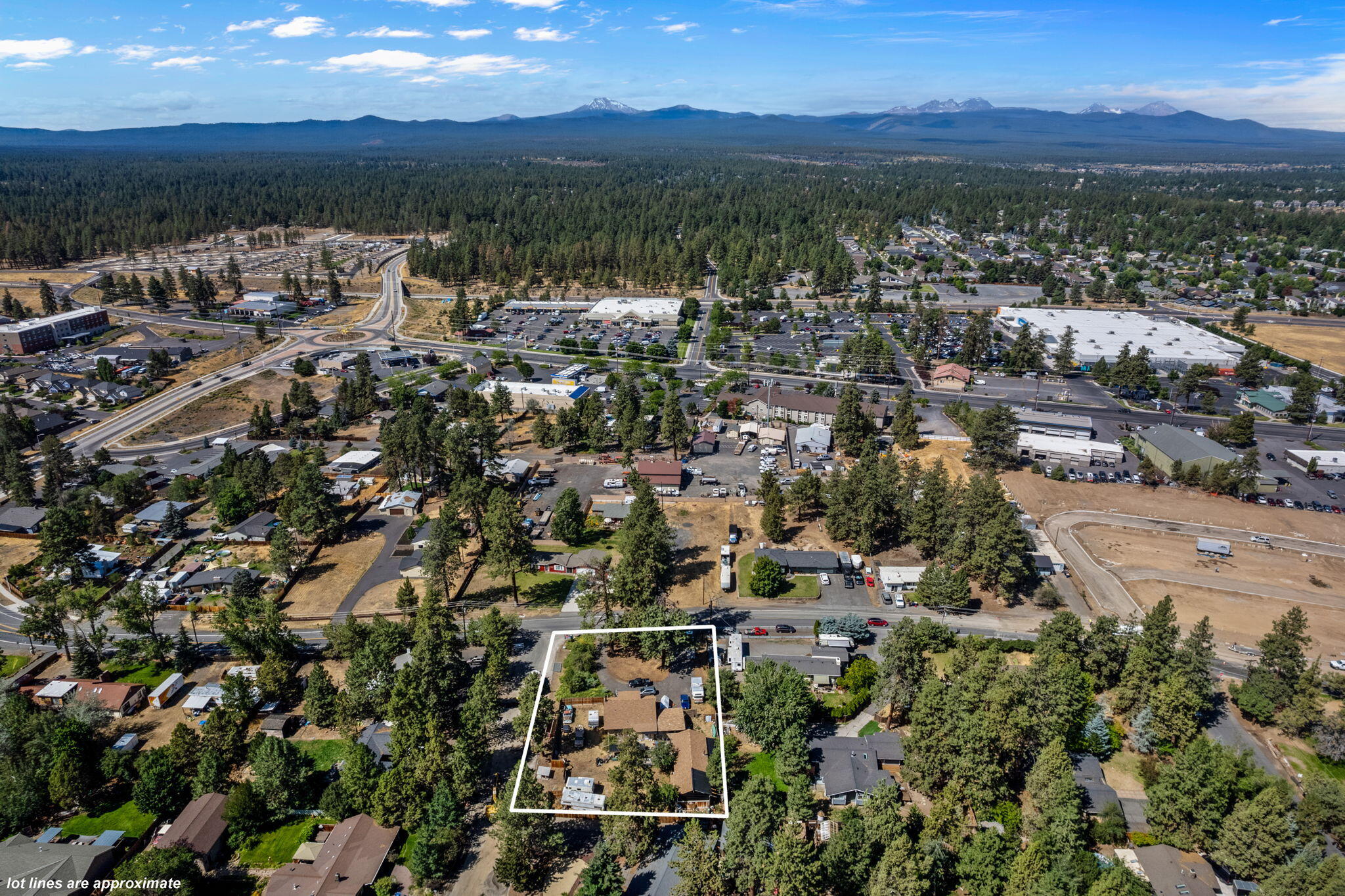 This property features a 1,600 sq ft occupied home, currently included in the sale.  The seller is offering this as a future development lot with exciting potential. The City of Bend has discussed with the seller's representative the possibility of dividing this lot into two parcels, ideal for multi-family new construction. Sewer is available at lot. Detailed information from the City of Bend meetings, as well as the survey conducted by CA Rowles Engineering, are available in the attachments. For further details, have your Realtor access these documents. Please respect the owner's privacy—viewings by appointment only.