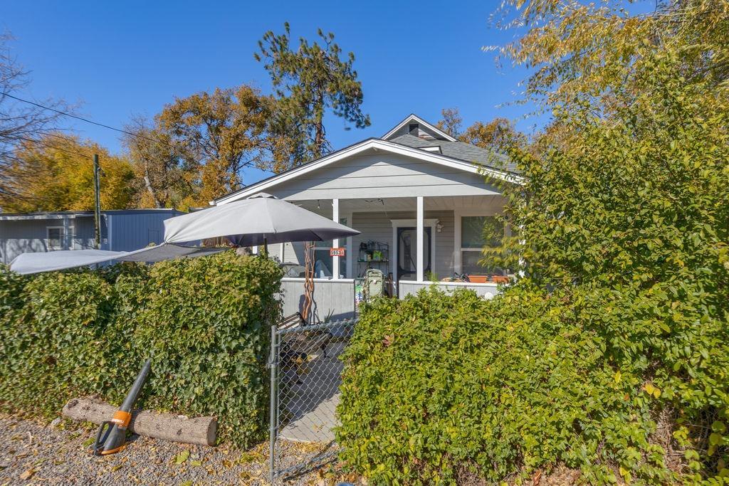 4.90 Acre Multi Faceted Investment Property. CAR WASH & 4 individual rental units. Unit A - 2 bedroom, 1 bath. Unit B - 3 bedroom, 2 bath, Unit C - 3 bedroom, 2 bath, Unit D 1 bedroom 1 bath. Combined rents $4,045 January 2020. All rentals on separate electric meters with city sewer connection. Water from private well on separate power meter with 2000 gallon buried concrete storage. Coin Operated'' car wash on busy and highly visible location. 4 bay stations with one that accommodates RV's and bigger rigs. Newer credit card pay stations, security system and separate coin vacuum island. Economically operated using solar power and softened well water, having a Net Operating Income for 2018 of $69,450. Additional wood frame 2 story shop with 960 sq. ft ground level slab floor with 10'x10' service entrance and partially finished second level. 10' by 40' lean-to storage on both sides. RV hook-ups near shop. Seller carry terms available with minimum 30% down