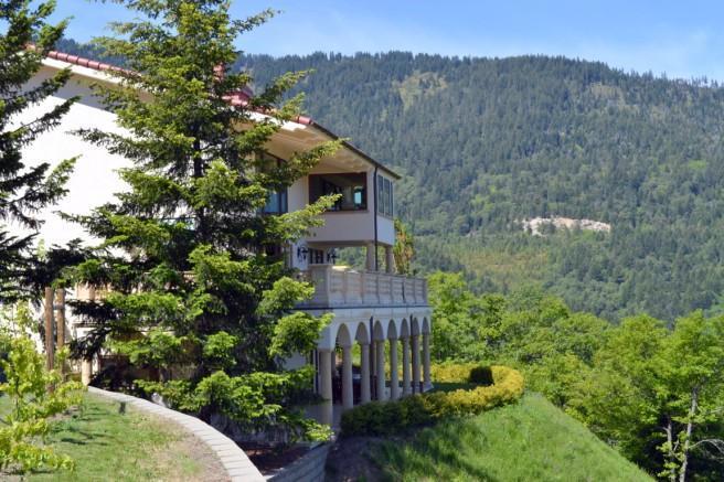 Magnificent 80 acre country villa located at the southern end of the Rogue Valley and just minutes to downtown Ashland. Panoramic views of the valley and Emigrant Lake can be enjoyed from the property. Each stately bedroom is en-suite and shares the same stunning views. Professional quality dream kitchen, luxurious outdoor pool and incredible outdoor kitchen, extensive use of walnut, marble, copper, custom designed & crafted iron railings, exquisite custom eight foot solid wood doors & stunning crown moldings. 24' high ceilings & grand staircase combine to create an extraordinary spacious and warm home. Raised bed gardens, amazing greenhouse, plentiful fruit trees in addition to 1 acre in grapes currently being sold to a local vintner. Enjoy having your own boutique winery or allow the property to be taken care of and managed.