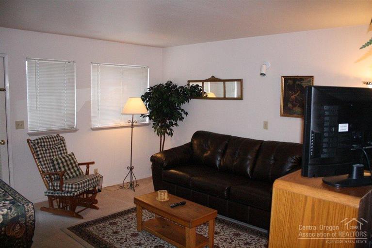 Here is your chance to own this cozy 1 bedroom, 1 bathroom condo. Just across the road from Sunriver an on the way to Mt. Bachelor & the High Lakes. This lower level condo has the makings of a truly comfortable rental or primary residence at an affordable price. Powder Village Condos have an on-site laundry facility in the complex and access to the condo hot tub & seasonal pool.