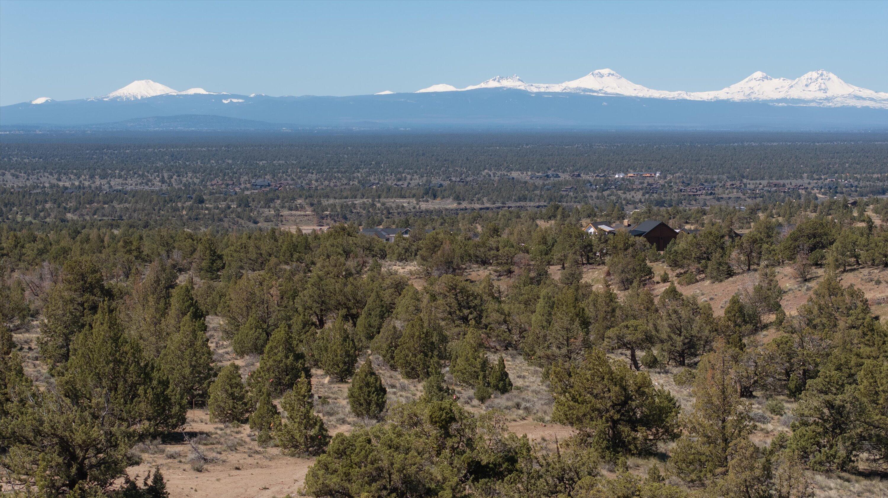Build your dream home surrounded by panoramic views of the Cascade Mountains. The lot is ideally situated on 0.94 acres to maximize vistas and is bordered by common space on two sides for added privacy. This property offers the perfect canvas to create a home that seamlessly blends with the natural beauty of its surroundings. The community boasts an array of amenities, including fine dining, 18 Hole Award Winning Golf Course, spa facilities, pools, pickleball, hiking trails, an equestrian center, and more! Must see to truly appreciate.