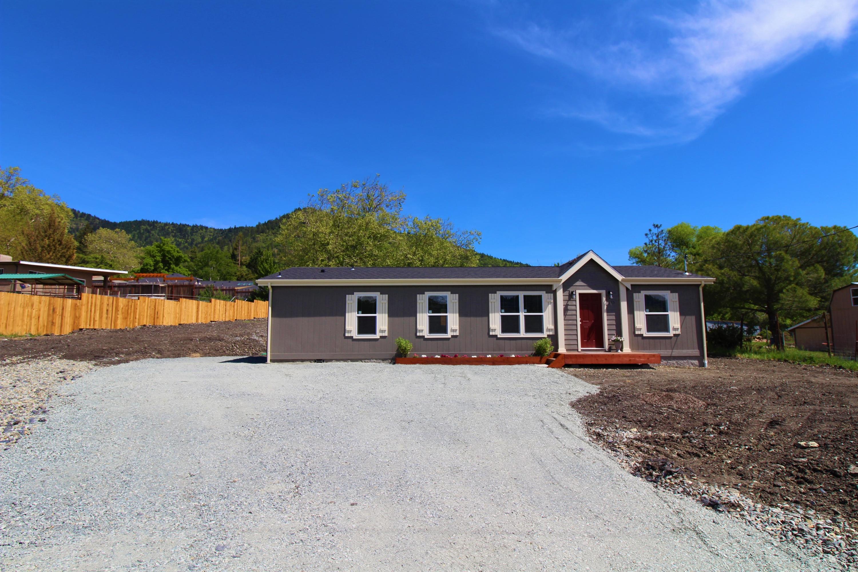 Here is your chance to live in a Brand New never lived in 3bed/2bath, 1404 sq/ft home on .48 acres. The home is located on a private drive close to town and the I-5 access ramp, but with county zoning and city schools. Come take a look today at this opportunity to make this home yours.