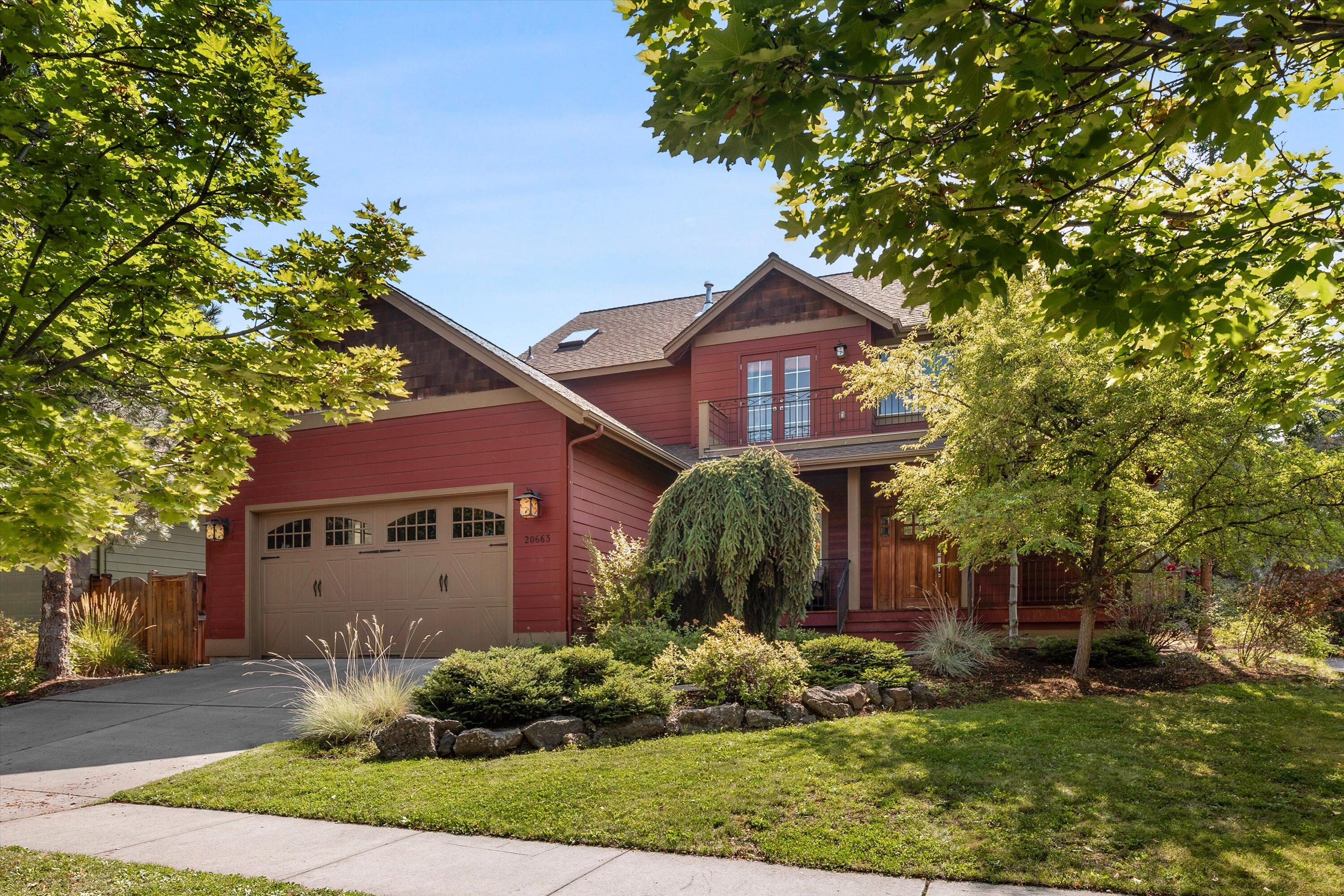 This custom-built Empire Construction home, with single homeowner since constructed, offers 3 bedrooms plus 2 bonus rooms. Additional flex space with vaulted ceilings and access to an upstairs balcony could be used for art studio or office. While a downstairs bonus room with French doors is ideal for an office or formal dining. With no HOA, and an unbeatable location—close to the new Costco, Hwy 97, Pine Nursery Park, and Cascade Shopping Center, this home has it all. The primary suite boasts his-and-her walk-in closets, a tile shower, and a jetted soaking tub. Enjoy north and south views from two balconies. A floor-to-ceiling rock fireplace,wood-burning and gas—anchors the spacious living area. Outside, garden beds, a back deck with spa hookup, and covered patio offers a serene setting to relax and unwind. Oversized finished two-car garage complete the package. With air conditioning, ceiling fans in every room, and natural gas, this is a rare opportunity in desirable Yardley Estates.