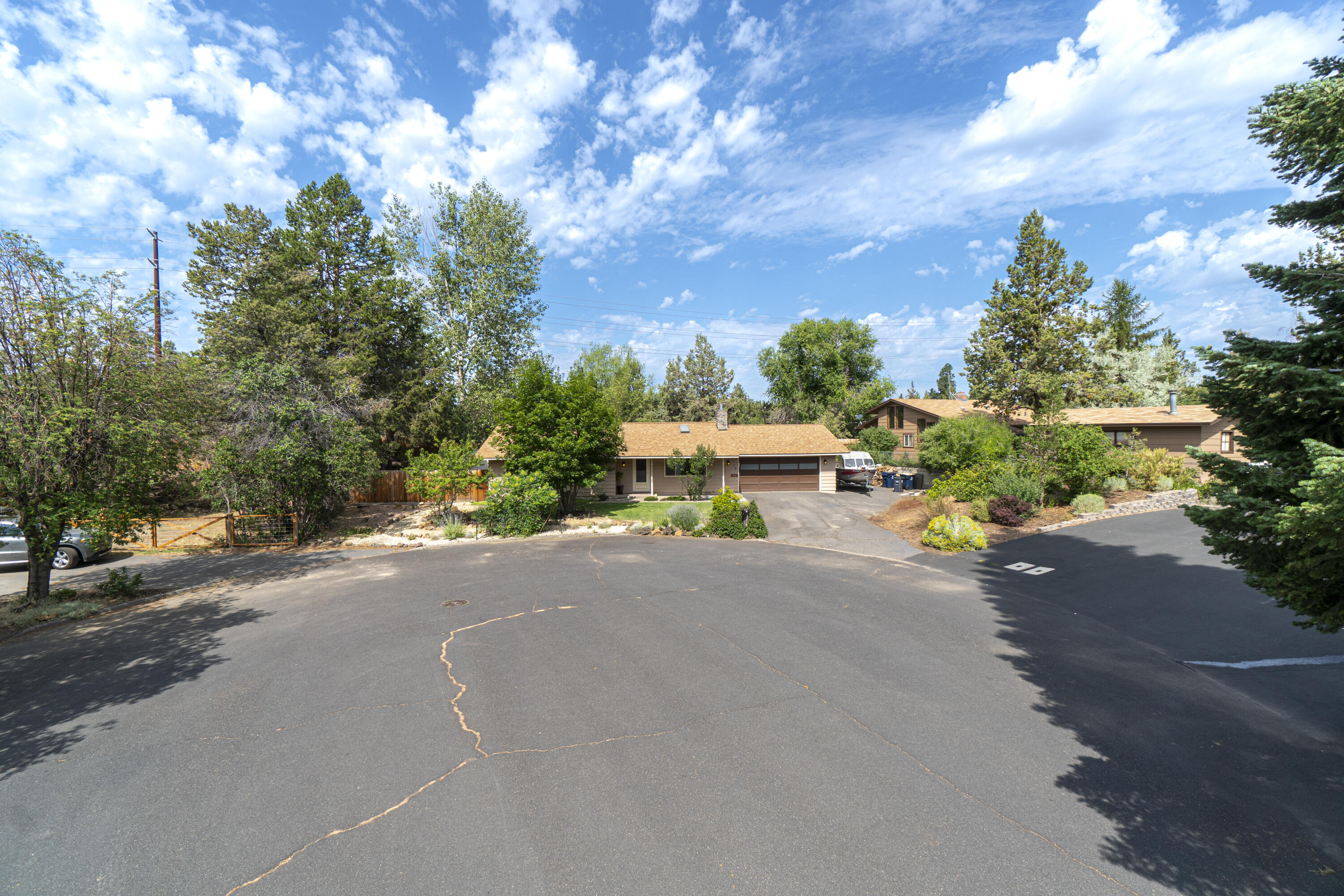 Are you looking for a single level home, on a large lot with no CC&R's or HOA, with room for RV/boat and easy access to walking trails?  Well, you've found it!  This 1426 sq ft single level home is situated on a .28 acre lot with gated access to the Larkspur trail right outside your park like, fenced backyard.  The roof was replaced in 2018, the gas furnace was replaced in 2021 & a new back porch awning in 2018, plus several other updates/upgrades on this home.  Did we mention that it is also located at the end of cul-de-sac and has A/C?  Near schools, shopping and trails. Overall, a very convenient location. You won't want to miss this one. In addition, seller is participating in  a rate lock program & interest rate has been locked at an under market rate for qualified buyers - see documents for more details.