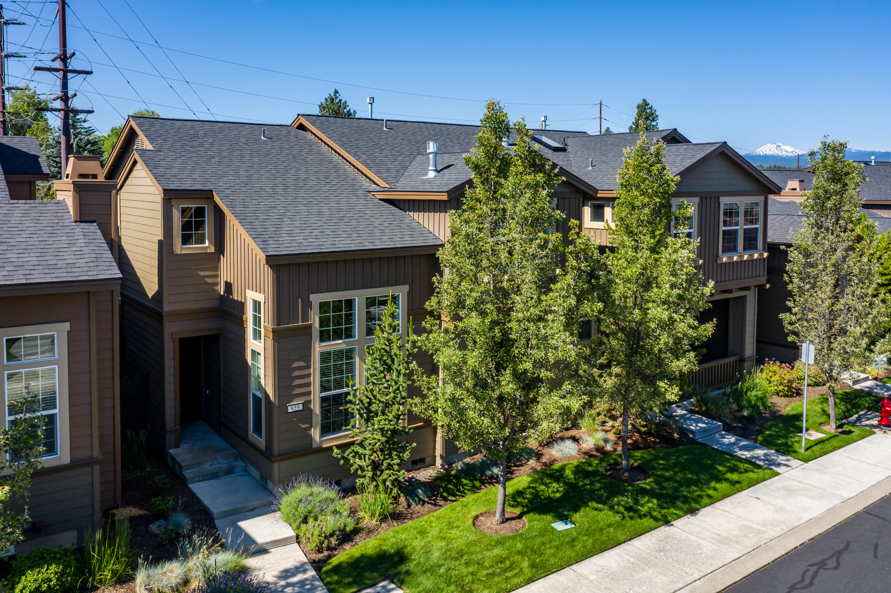 Central Oregon living at it's best in this 3 bed, 3 bath, 1763 sqft townhome in SW Bend's Bluffs at River Bend.  Location, location, location.  Close to the Old Mill District, Deschutes River, Parks, Shopping, plus much more.  Outstanding great room floor plan with massive vaulted ceilings, built ins, and gas fireplace. Open kitchen with hardwood floors, stainless steel appliances, designated dining area, and breakfast bar. Inviting dining room and private outdoor courtyard are perfect for entertaining. A perfect getaway complete with double master suites on second story and detached 2 car garage.  Call your Realtor for a private showing today.