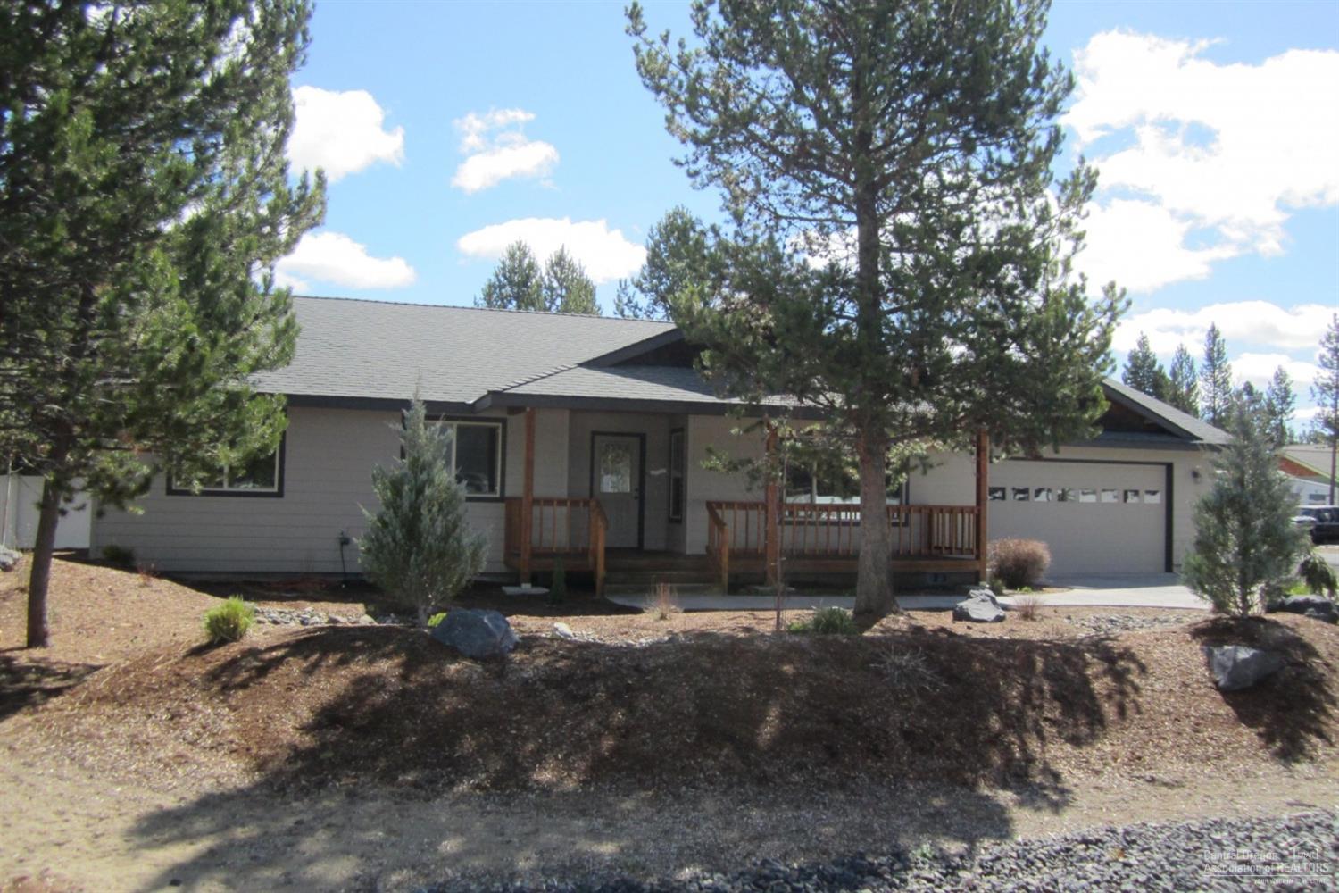 Beautiful custom built home in the heart of La Pine in the peaceful R&W Estates. Perry Walters built home with quality craftsmanship. Large open concept floor plan with vaulted ceilings and warm wood trim throughout.Recently updated appliances, over sized two car garage and plenty of out door RV parking. Beautiful landscaping, covered front and back patios. This home is move in ready and must see.