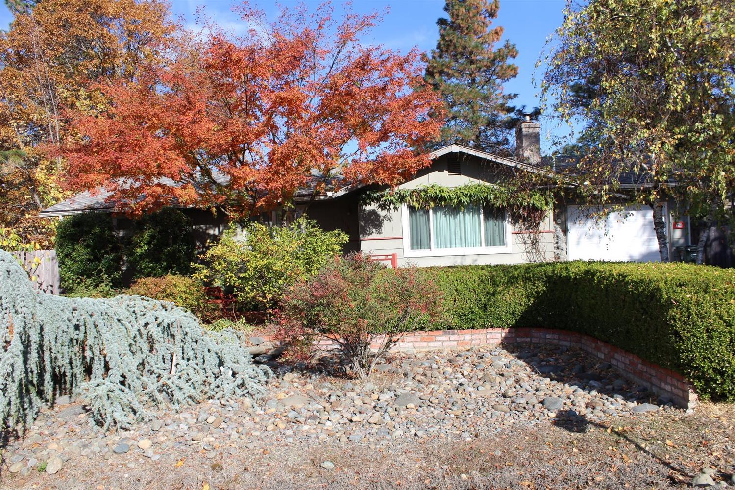 Nice 3 bedroom 2 bath home located in the City of Cave Junction. This home has been well cared for and offers a lovely back yard with raised garden beds, mature landscaping, a nice finished detached 468 sq/ft shop with a wood stove for all those hobby's or extra storage , car port, and RV parking. There is also an attached garage, sun room, master bedroom with master bathroom, and a nice partially covered back deck good for family BBQ's and entertaining. Schedule your showing today. All information deemed reliable, but not verified nor guaranteed. Buyer to do own due diligence into this property.
