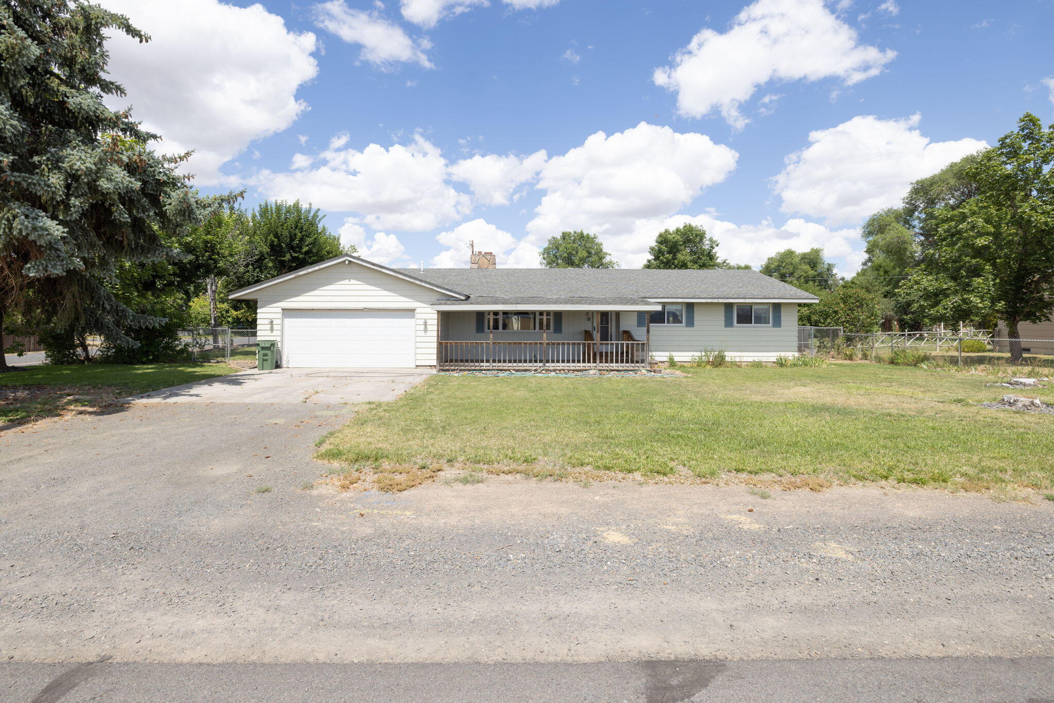 Excellent primary residence or second home for the Central Oregon outdoor enthusiast. Located in the peaceful, historic town of Metolius! Situated on a spacious double Jot totaling -32 acres, this well maintained 4-bedroom, 2.5-bath home offers comfort, convenience, and room to grow. This home features an attached double-car garage, fully fenced backyard with underground sprinklers, and mature landscaping. This property also includes a large 1,200 sq. ft. shop, built in 2009, complete with a loft, roll-up doors large enough to accommodate your RV or boat, and has a dedicated side entrance. Whether you need extra storage, or are looking to have a workshop, this space is the perfect complement to the home. Enjoy expansive views of the southern farm fields. The location of this property offers excellent access to all of Central Oregon's abundant outdoor activities and recreation.