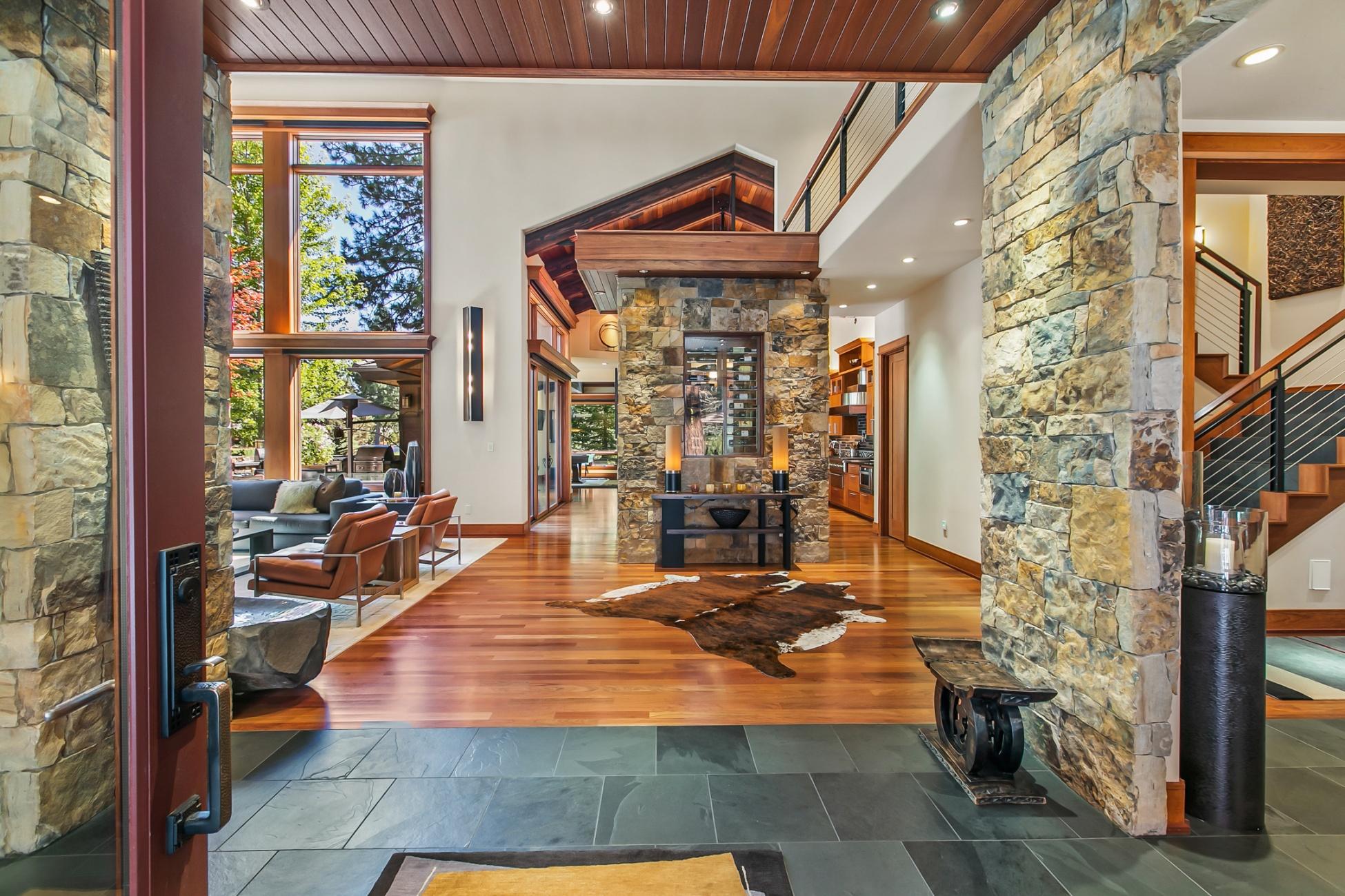 Artfully uniting extraordinary homes w/ extraordinary lives.  Privacy and golf course views define this exquisite Broken Top estate located in the heart of Bend, Oregon. Exceptional artistry and craftsmanship went into the construction of this home which boast dramatic and custom finishes throughout. Enjoy sun filled days on the enlarged patio w/ multiple sitting spaces, water feature, outdoor kitchen, and hot tub.  The home boasts, a grand entrance w/ open ceilings and views of the cable railing balcony and sitting area, living room w/ walls of windows to the golf course and gardens, lovely dining w/ four fireplaces through-out the home, gourmet kitchen that flows into a large game area w/ wet bar, guest suite w/ separate entrance, oversized office w/ built-in cabinets, desk & deck overlooking the golf course, private theater room, wine room & 5 car heated garage w/ custom cabinetry & epoxy flooring, AMX smart home rounds out this exquisite home. Home sold partially furnished.