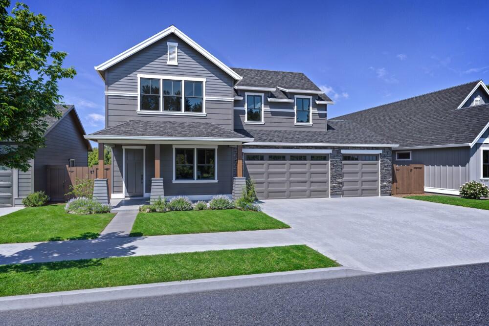 Nestled under a canopy of Ponderosa Pines is lot 13 in the Signature community of Pahlisch Homes, Collier. The Shasta floor plan will dazzle you with its open space and natural light from the abundance of windows. With the three guest rooms and office in addition to the primary suite there is plenty of space for all. High-end finishes like JennAir appliances, tile walk-in shower and engineered hardwood floors complete this stunning home. Three car garage has two bays that are tandem making room for 5 cars! Home sites back green space giving the feeling of peace and serenity. Situated less than a mile from the shops and restaurants at Northwest Crossing and nearby parks and schools you are close to all the happenings in northwest Bend. Enjoy having all the trails right outside your backyard and easy access to Mt. Bachelor and the Cascade lakes.
