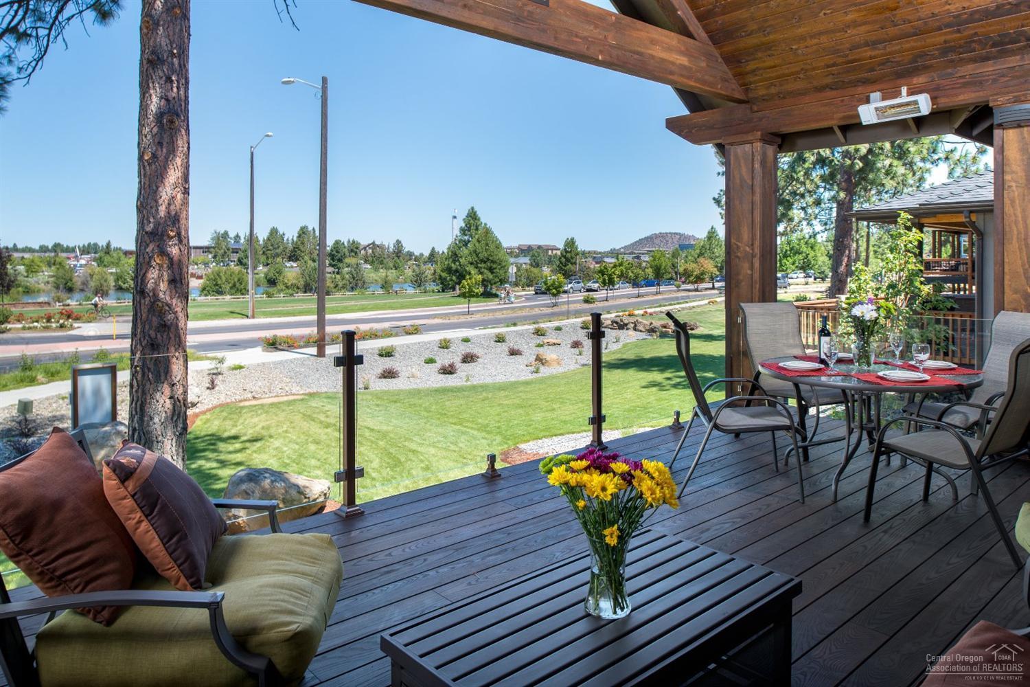 Get yourself a piece of the American Dream! Ultimate location in Bend, across from the Deschutes River in the Old Mill district. The River Trail and top caliber shopping and dining option are beckoning you. Easy commute to Mt. Bachelor and all Bend has to offer. Amazing craftsmanship and thoughtful design fuse to offer understated sophistication. This home has numerous features not seen before in this area and rarely at this price. Ask for complete list of features! Don't wait.