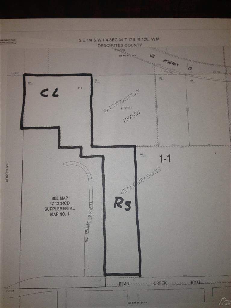 24 ft easement behind Smolich Motors to Hwy 20. 3 water and sewer connections to property. 4 Acres of CL/CG property west of Smolich Motors then 4 acres of RS which connects to Bear Creek Rd. all in one tax lot.