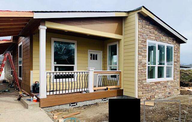 Here's a new listing #81 in popular Mountain View Estates, a 55+ community. Mountain View Estates is still owned by the local family that developed it in 1987. 21 homes of the 164 homes survived the Alameda Fire of 2020. The park is being restored & is now welcoming new and returning residents to this vibrant community. There's a brand-new dog park and mailbox kiosk with parking at the entry. This 1495sf brand-new Skyline 3 bedroom, 2 bath home features 9' coffered ceilings. The large master bedroom runs across the back of the home. Double vanity in the bathroom with a step-in shower. The kitchen & living area are in the front with views of the neighborhood. Upgraded rustic hickory cabinets will please the cook. You've got plenty of space for your cars under the carport. A front porch for enjoying the outdoors, too. Vinyl fencing included along with sewer & trash. One small pet up to 25 lbs allowed. Interesting? You bet!