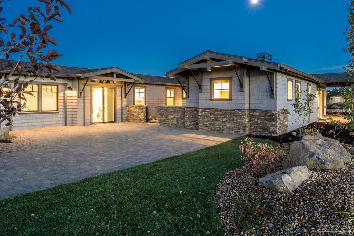 SINGLE LEVEL home that is light, bright & open, with a fabulous great room, gourmet kitchen, luxurious master-suite, 2 full en-suite guest-rooms, large private office & gated courtyard. Located in the Tetherow Resort & Golf community, The Rim offers exceptional mountain views, miles of walking paths & mountain biking right out your back door, Mt Bachelor & Downtown Bend minutes away. Social Memb incl.pool,spa,workout,& tennis. Photos of Model Home