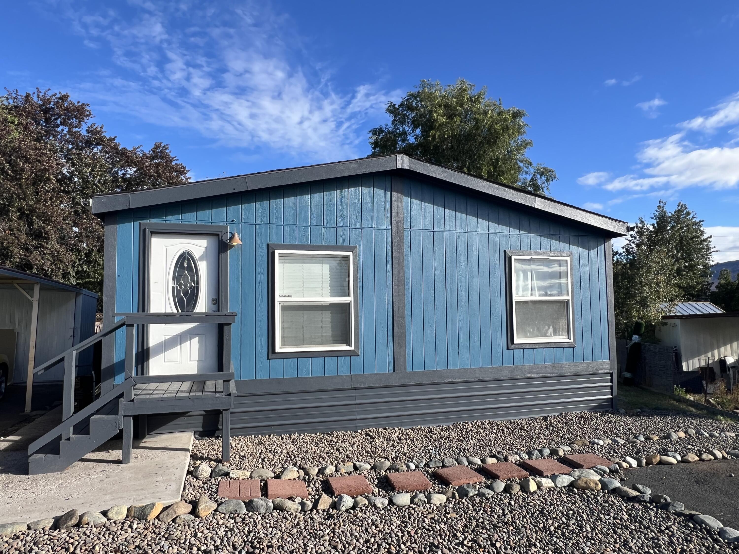 NEW 30 YEAR ROOF! Exterior recently painted. This home is in Villa West manufactured home park located at 2241 Greenspring's Drive. Monthly lease has sewer and water included in the space rent, currently at $483 per month. Park has RV overflow space for $25 per month. All the park roads are provided snow removal. Park requires preapproval before close of escrow with applicant paying a screening charge of $39.95 per adult. Villa West is an owner occupancy park.