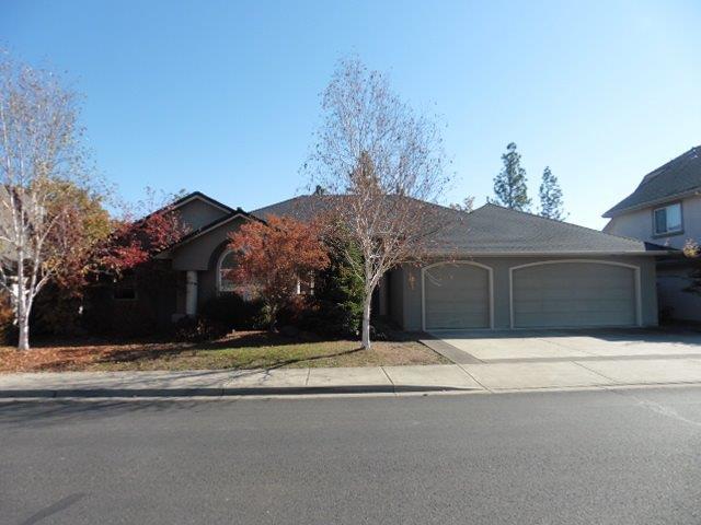 Luxury with awesome golf course views! Wonderful golf course property offers a large 3 car garage and back patio that overlooks the Eagle Point Golf Course. Step inside to this split floor plan that offers a huge maser suite complete with double vanity, jetted tub and large walk in closet. Enjoy a gigantic living room/great room with soaring ceilings, a wall of windows and a fireplace. Well appointed kitchen offers tons of storage and stainless steel appliances. 2 more guest bedrooms and a separate office with fireplace round out this attractive property.