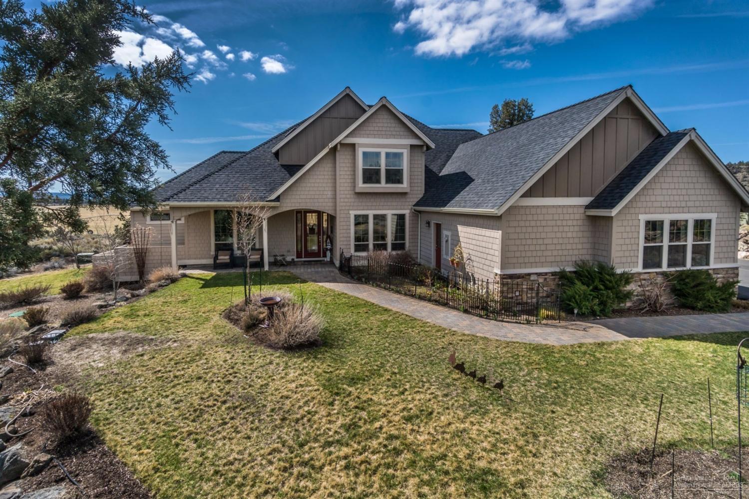 Exquisite custom home with some of Central Oregon's best mountain views in just about every room. Eastern Elm wood floors, custom cabinetry, granite, 5 Burner Dacor range, Dual climate/ 3 zone control with 2 furnaces and 2 heat pumpsoffer optimal quality of living, 24 x 36 RV Garage built within ARC guidelines to match home, ARC approved fenced raised bed 32x24 garden, Master on the main level, with 60 acres of beautifully maintained pasture off back deck. Gated Communtiy with private Deschutes River Access