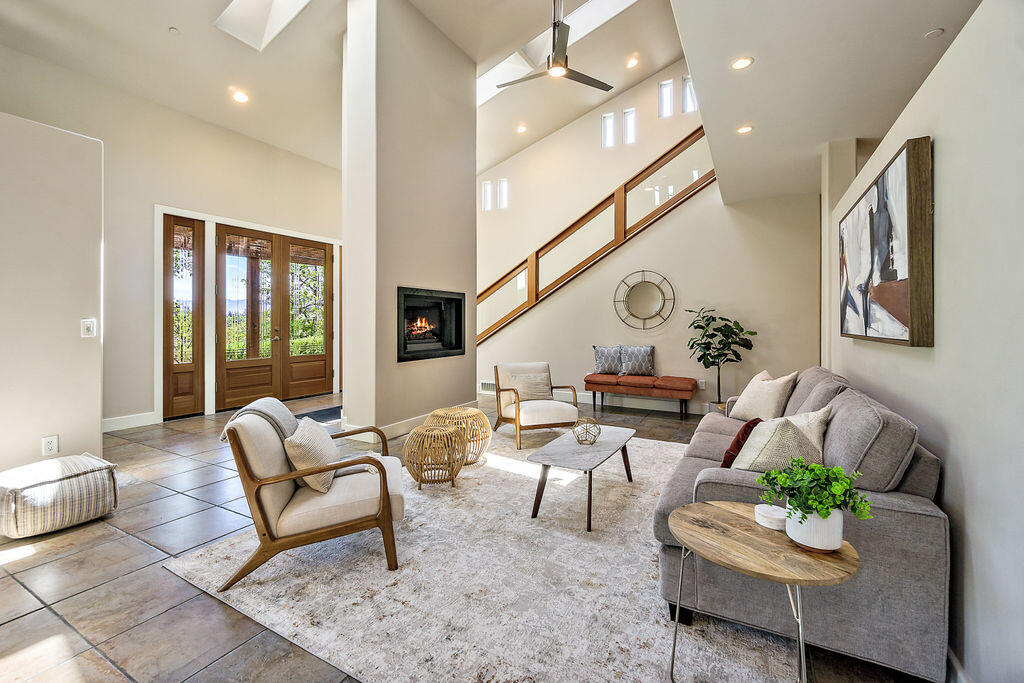 This seller is ready for your offer! Amazing custom-built home on a hard to find .70 acre private lot, just a stone's throw to hiking trails, Lithia Park & downtown. You will not be disappointed in the all top quality finishes including tile & Doug Fir flooring, doors, gorgeous, top of the line kitchen w/ granite countertops, Cherry cabinets, great storage, stainless appliances & breakfast bar. The versatile floorplan features both living & family rooms, two fireplaces & a cathedral ceiling showcasing the stunning staircase. Great wall space & lighting provide incredible opportunity for displaying art. Incredible views & an inviting solarium. Main level owner suite w/ slate bathroom, complete w/ dual vanities, soaking tub, oversized shower w/ dual heads & walk-in closet w/ built-ins. Addtn'l beds/baths upstairs + an exercise room. Impressive roof top deck over garage for outdoor entertaining. New state of the art HVAC system w/ HEPA air filter purification provides year-round comfort.