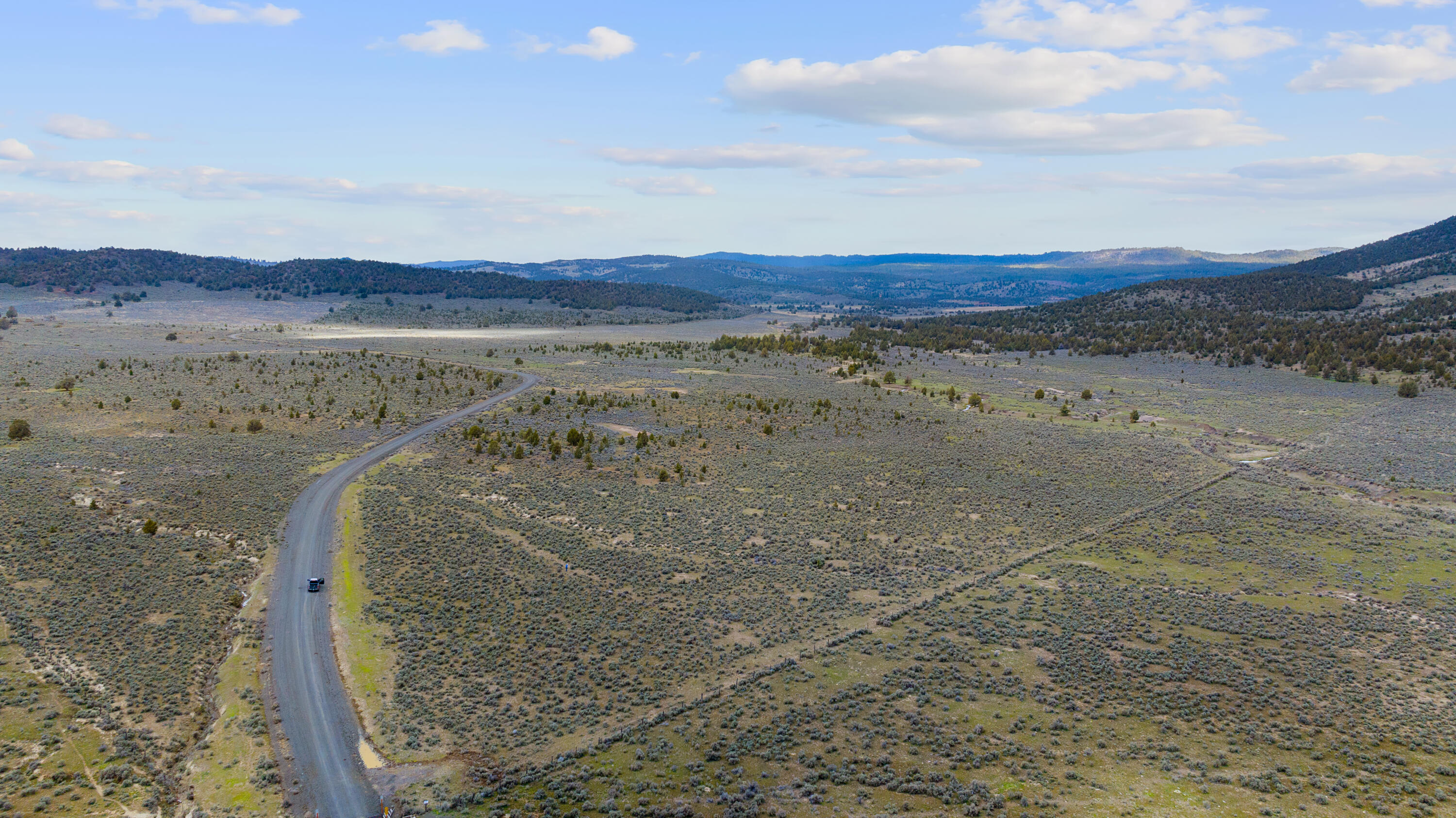 Tackman Ranch is a true high-desert retreat designed for ranching, recreation, and privacy. Spanning 3,190± deeded acres with an additional 1,820± acres of BLM grazing allotment, this property provides the space and resources for a successful cow/calf operation. Located in southeast Crook County, just an hour from Prineville, it lies south of the Maury Mountains and the Ochoco National Forest, offering both seclusion and natural beauty.