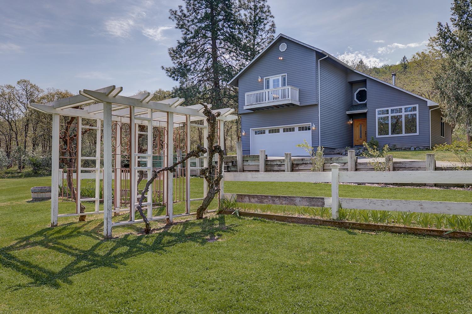 Great opportunity to own a beautiful flag lot tucked away off historic Old Stage Road. This property is just over 5 acres of perfectly manicured land with a 2308 sqft 2 story home. As you look out over the large front yard through top of the line windows you will see an area to house chickens, goats, or sheep. A seasonal creek runs though the bottom of the property with an abundance of wildlife coming to visit. This is a perfect place to raise a family and relax in privacy. This property is a must see.
