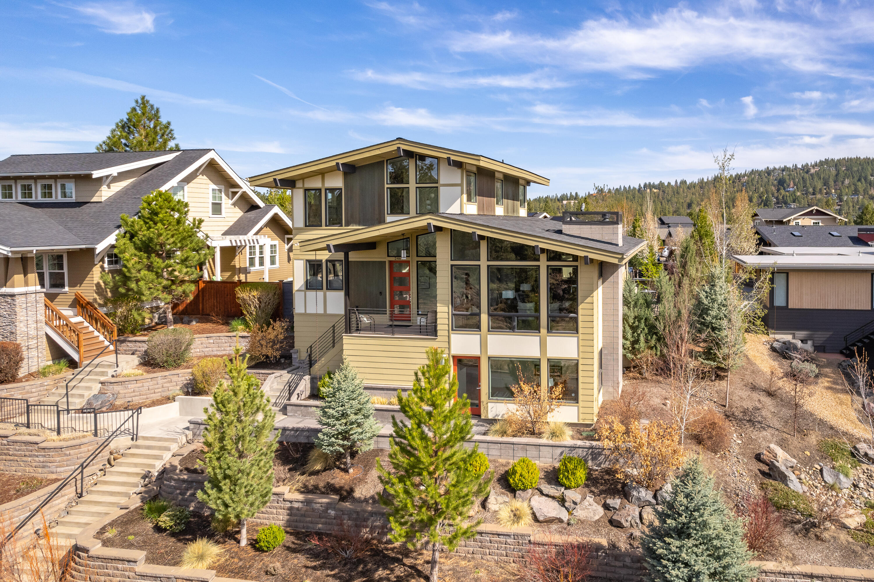 Located in the highly desirable neighborhood of Northwest Crossing, this NW Bend home offers the best of both worlds - easy access to Bend's amenities and your own private retreat with sweeping views of open space. With 4 bedrooms and 3.5 bathrooms spread over 2572 SF, this stunning home is perfect for full-time living or a relaxing Central Oregon getaway. The primary bedroom is conveniently located on the main level and accessible without steps from the garage level. The great room is a highlight, with vaulted ceilings and oversized windows showcasing views and natural light. The lower-level is versatile and can be a second guest suite, home office, or bonus room with private entrance. The upper-level has two bedrooms, a bathroom, and a loft area with views of Rim Rock park. Relax in the private backyard oasis, or enjoy the bustling Galveston Ave corridor just moments away. The home is also equipped with $20,000 worth of solar panels to keep utility costs low while helping the planet.