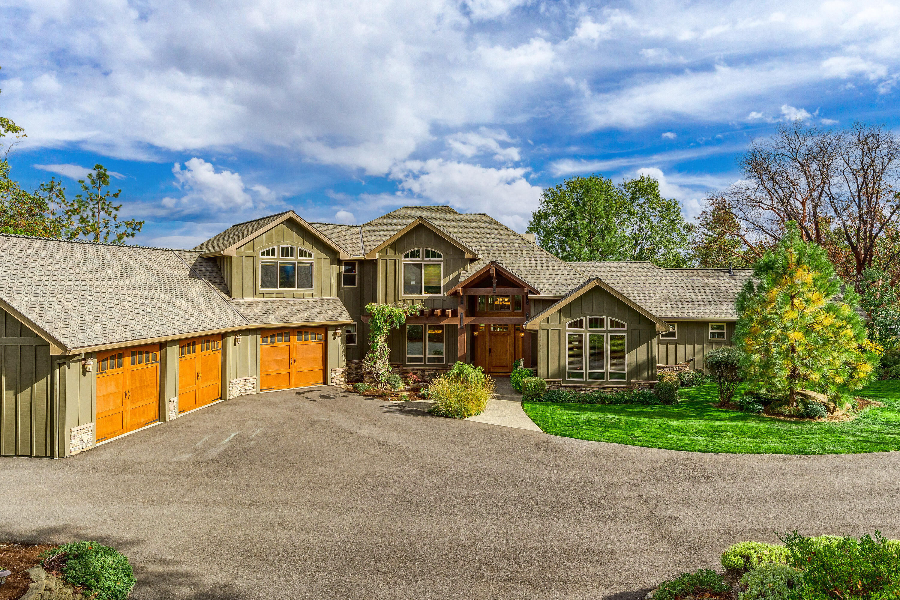 This 3 bedroom, 2 full, 2 half bath, office
 on 8.66ac., open floor plan w/ entertaining in mind.  Huge master suite w/ walk-in shower, dbl vanity, door leading to patio and a large sunroom w/ jacuzzi. Custom kitchen w/ gas cooktop, dbl oven, brass sinks, Amish wood floor, walk-in pantry and all a chef could want and formal dinning.  Home features a large game room with wet bar, pool table, & heavy weight equipment.  Oversized 3 car attached garage and custom work shop, built-in cabinets, & overhead storage. GAF 50 year roof, 1700 in ground, 2500 above ground water storage, interior doors are solid Alder wood. Other features include high arched fireplace in livng room, f/p in mstr, upgraded Emtek locks, 12x12 wood beams, covered patio, kennel w/ H&C water for bathing and fantastic views.  A 2nd contiguous .92ac property is available with sale at the right price.  If not included in sale, seller will need easement.
The list of amazing amenadies is too large to list, A MUST SEE!