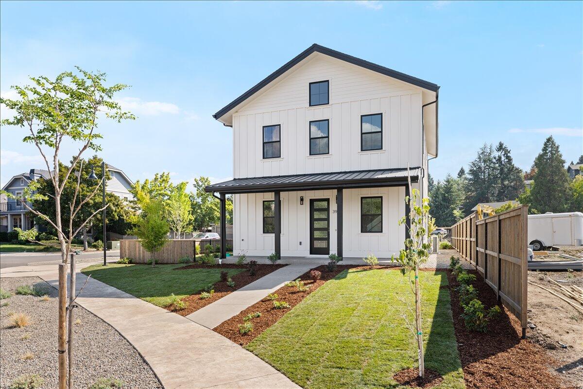Stunning new construction in Ashland's Magnolia Meadows! This exceptional three-bedroom home showcases a unique design and thoughtful use of space, making it a true neighborhood gem. Plus, there is a deluxe one-bedroom suite above the garage!  Enjoy a pitched roof ready for solar panels, a fully fenced yard with drip irrigation, and beautifully landscaped grounds with views of Grizzly Peak. Inside, you'll benefit from top-of-the-line heating and cooling, on-demand hot water, and heated flooring in the primary bath.
An elegant vaulted ceiling highlights the upstairs, while a gas fireplace creates a warm focal point, complemented by 8-foot rift oak doors. The main residence offers a deluxe primary suite and wide-planked hardwood oak floors throughout the expansive living and dining area. Custom built-ins, quartz countertops, and a gourmet kitchen with a 36'' Bosch induction range, wine cooler, and more complete this remarkable home.  Discover your dream property in Magnolia Meadow