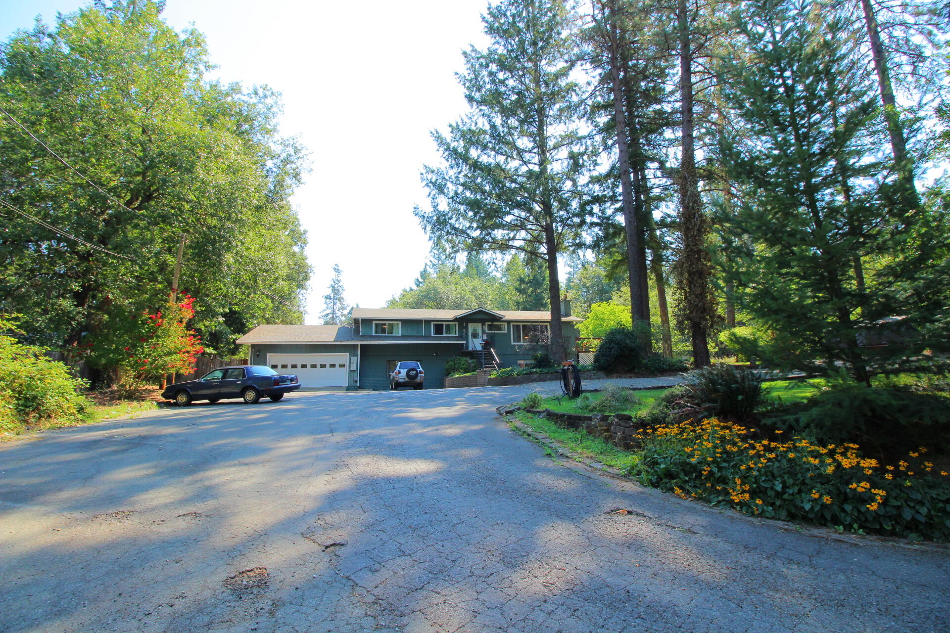 Dreaming of a 1 acre country estate, with a very roomy WORK SHOP for the mechanic and a POOL and tiki bar for those who LOVE a ''staycation'' resort lifestyle??!!
This property has everything you ever hoped for and MORE...upgraded and updated throughout! Gorgeous cozy wood burning fireplace (upstairs and downstairs) snuggle up near the fire with your book enjoying the Oregon seasons! Covered outdoor dining area allows for endless year round enjoyment of this slice of paradise! SO many options for multi generational living quarters or income (seller previously utilized as rental spaces) tastefully set up for single or multi use, just perfect! AMAZING workshop with 2 roll up doors and wood stove for project time! PLUS over sized garage.  This amazing mini estate is on a timber lined country lane, but minutes from ALL the amenities (shop/doc/dine/gym) the absolutely ideal LOCATION -location- location! Peace, tranquility and privacy await you for that next season of living your dream!