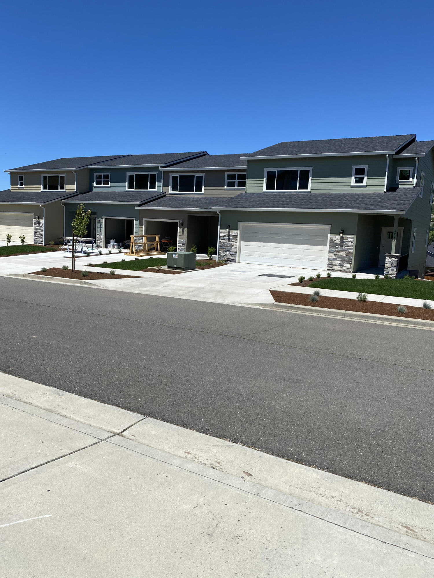 New 4-plex town homes in desirable East Medford with views. Enter the main floor of 4317 Hathaway to an open great rm, dining, kitchen & powder rm. Granite counter tops in the kitchen with a large island, stainless appliances, gas stove & loads of storage. A wall of windows & sliding glass door lead to a large covered deck & views of Roxy Ann peak. Head upstairs to an amazing master suite with views, huge walk-in closet with built -in drawers & organizers. The en-suite bath has a granite double vanity & tiled walk in shower. There is a second bedroom on this level with walk in- closet, full bath. The downstairs level includes a large family room, game or hobby room. The other units are the same top notch construction & similar amenities. At $133.00/sq ft, these units are priced under market for a great investment. 
6% cap rate if owner managed

Building permit numbers 18-02375, 18-0237,18-02376,18-0238

Taxes=Land only