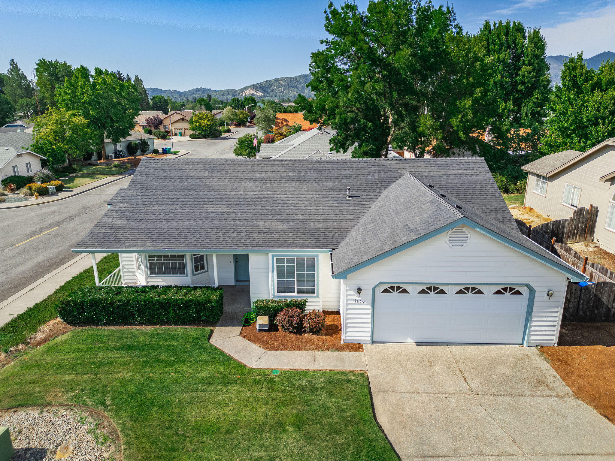 Charming home in a desirable location, close to shopping, hospital, and restaurants.  This home is ready for you to move in.  It has been lovingly cared for and maintained.  The yard is lower maintenance with mature landscaping and is on a large corner lot that is fully fenced and irrigated by an in-ground sprinkler system.  Inside the home it is light and bright with plenty of windows and solid surface window seals.  There is a nice size walk-in closet in the main bedroom and window coverings throughout.